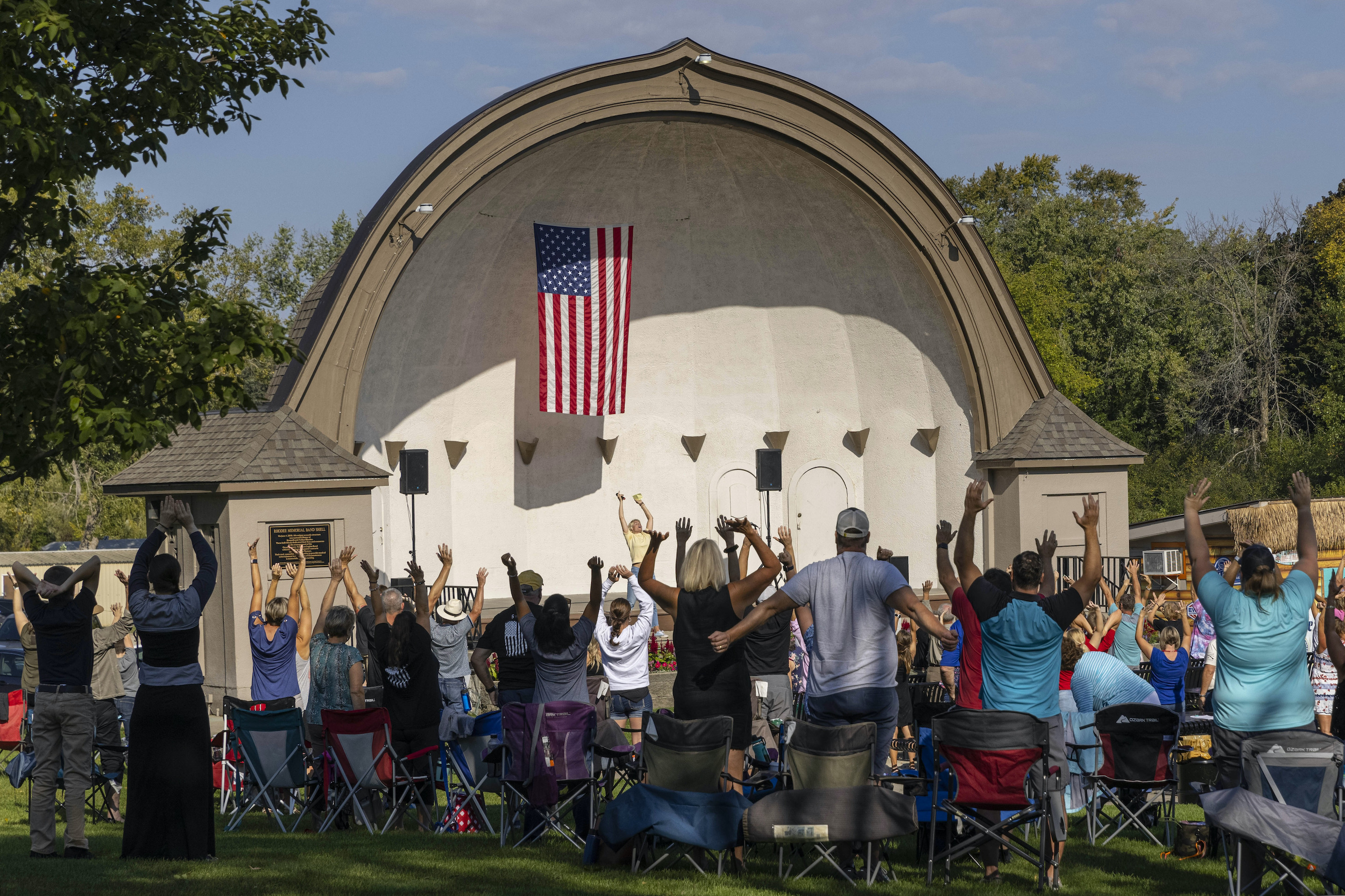 People listen to speakers at the Chiropractic Society Health Freedom revival Sunday, Sept 19, 2021 in Oconomowoc, Wisconsin.