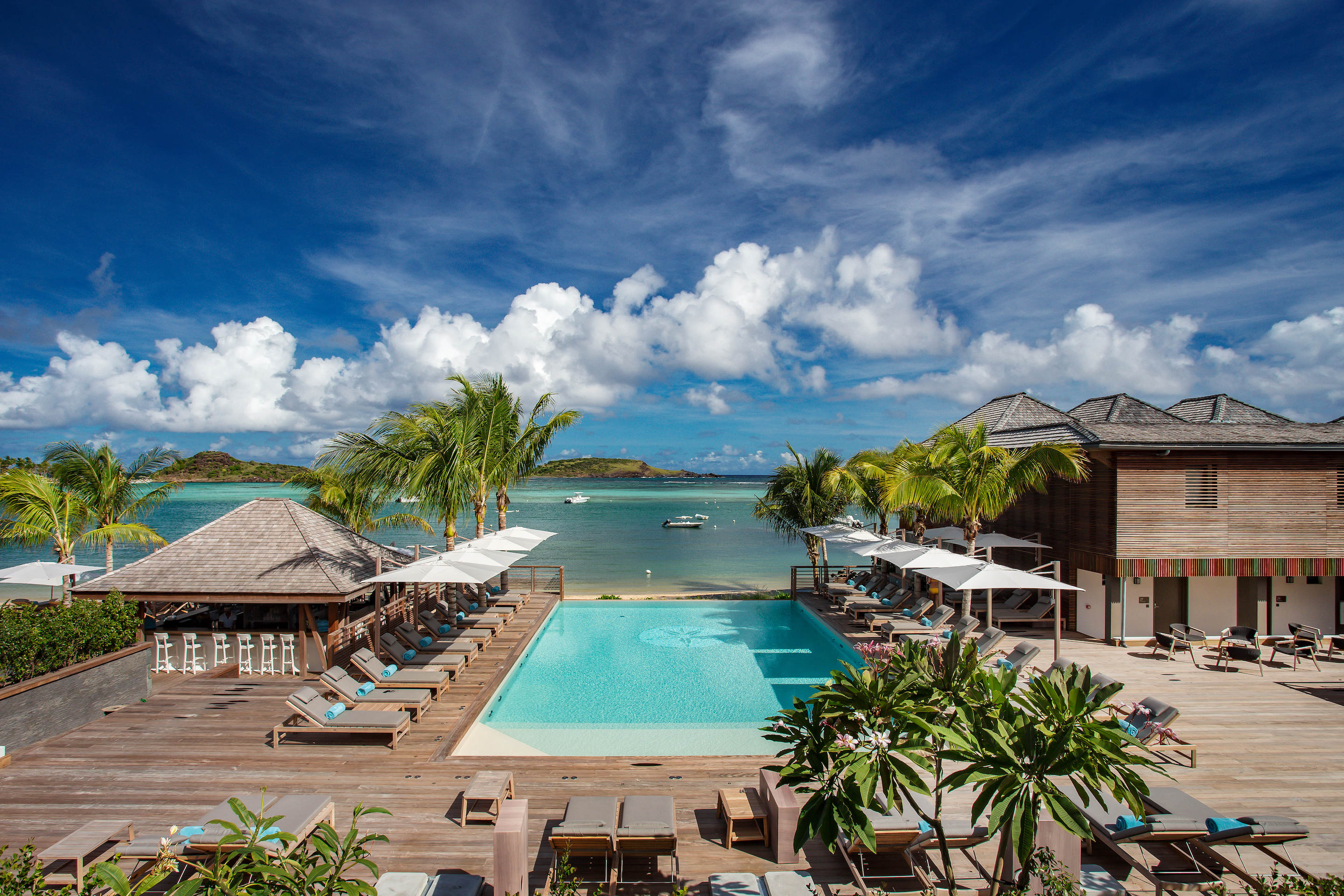 Nestled on a quiet bay on the famed Grand Cul de Sac, the 44-room hotel features open-air design with beachfront dining venues, a holistic spa, and a rooftop bar.