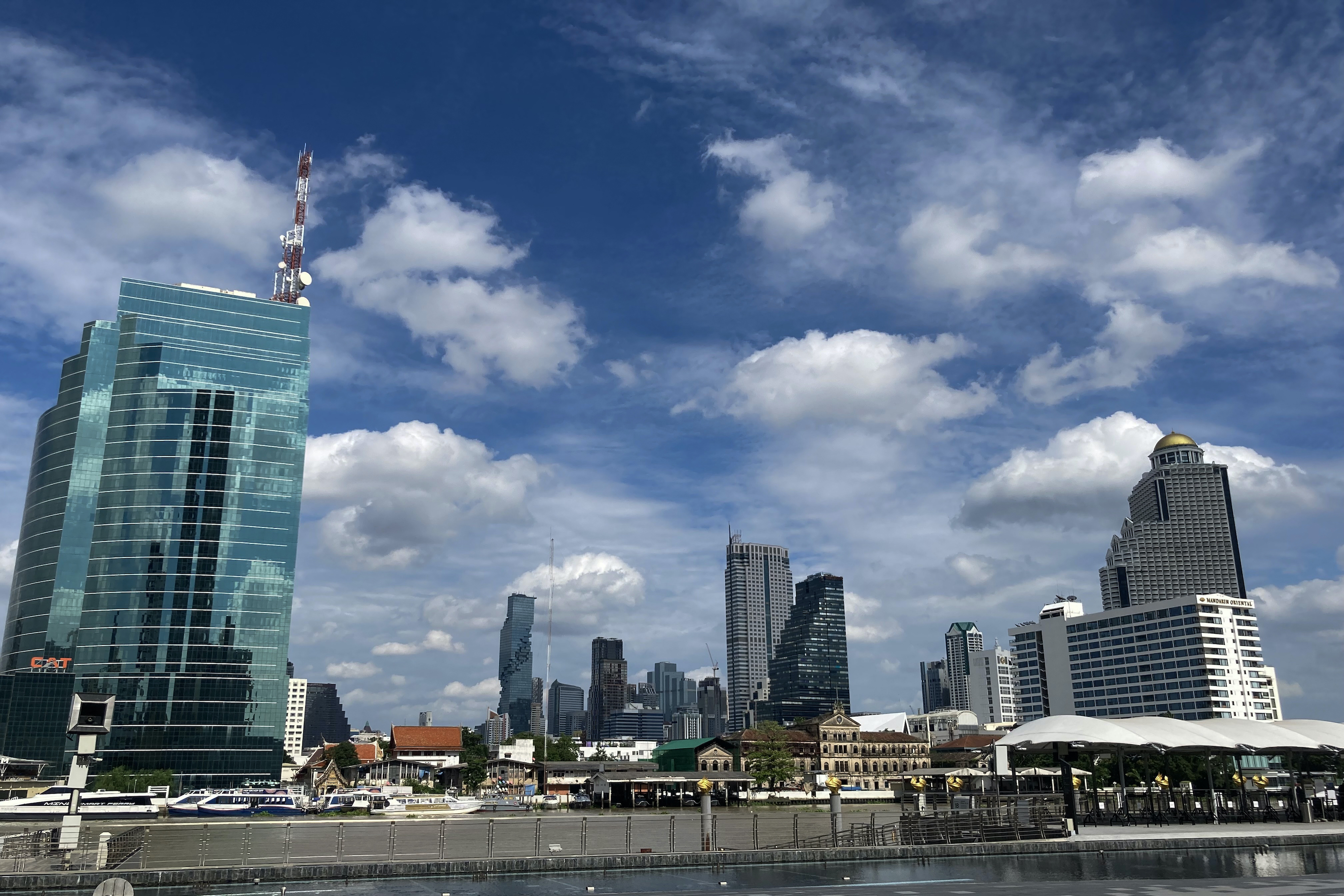 Clouds are in the sky above the Bangkok skyline on September 12, 2021. Thailand is welcoming fully vaccinated tourists from 10 low-risk countries in November.