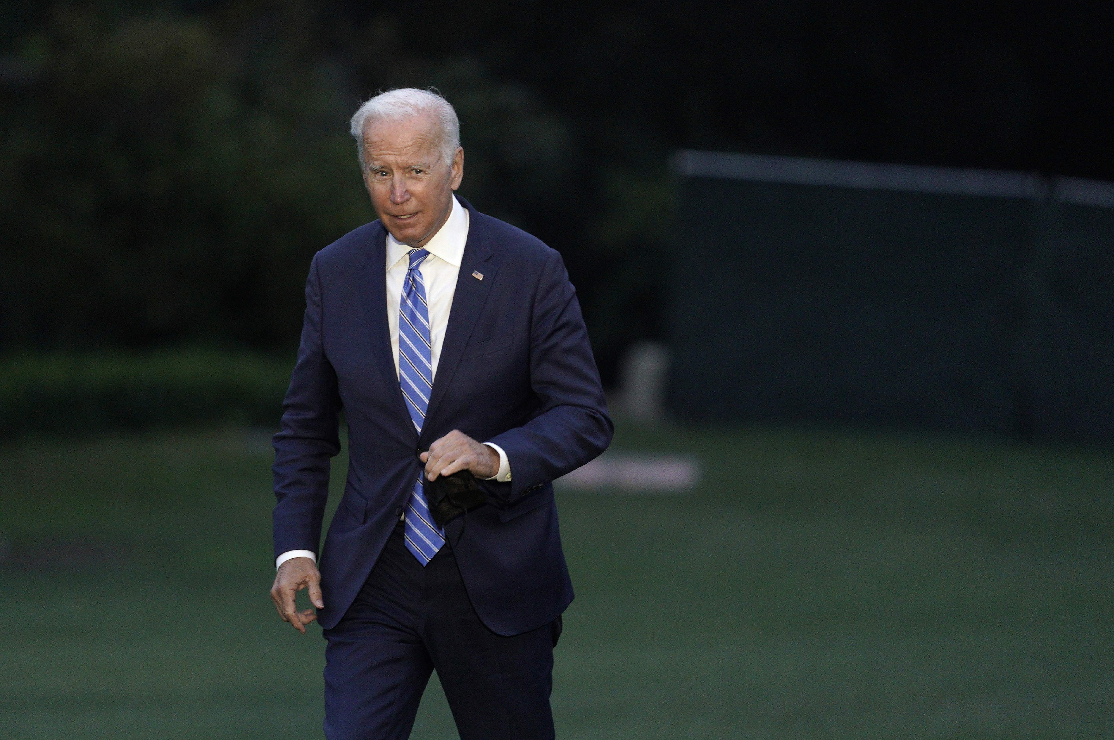 Biden sought to shore up support for his economic agenda among centrist lawmakers with a trip to Michigan, with disagreements among Democratic factions stalling key measures on infrastructure and social programs.