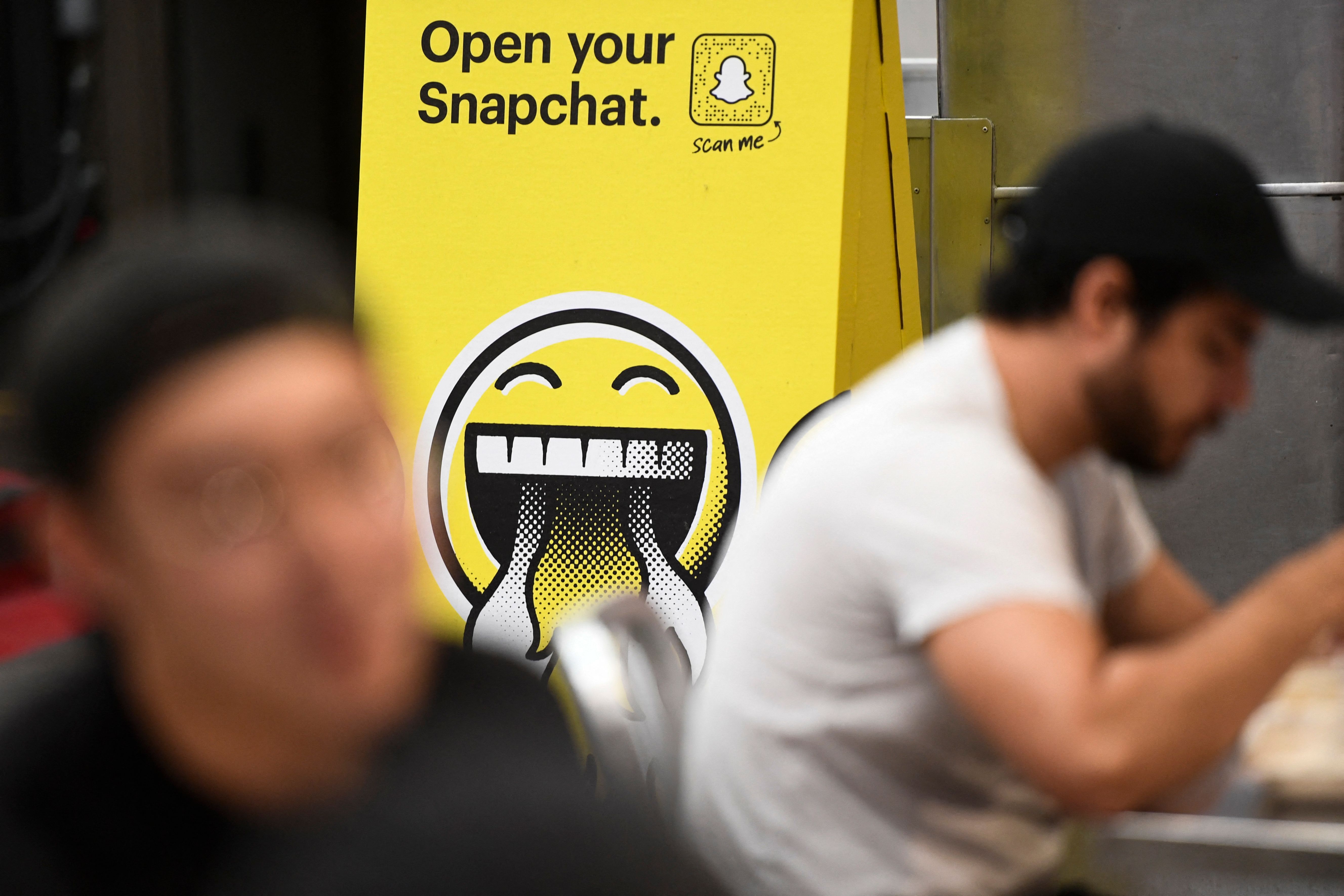 Shares in Snap Inc. lost nearly one-quarter of their value in pre-market trading after the social media firm warned of a pullback from advertisers.