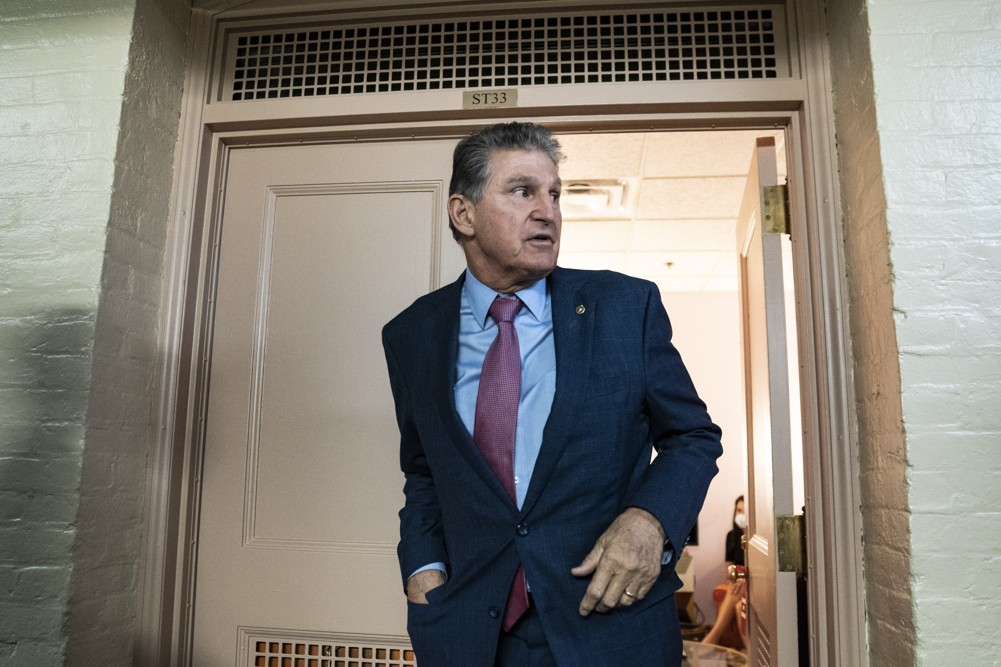 Sen. Joe Manchin, D-W.Va., departs after a meeting with Sen. Kyrsten Sinema, D-Ariz., and White House officials on Capitol Hill on Oct. 21, 2021 in Washington, D.C.