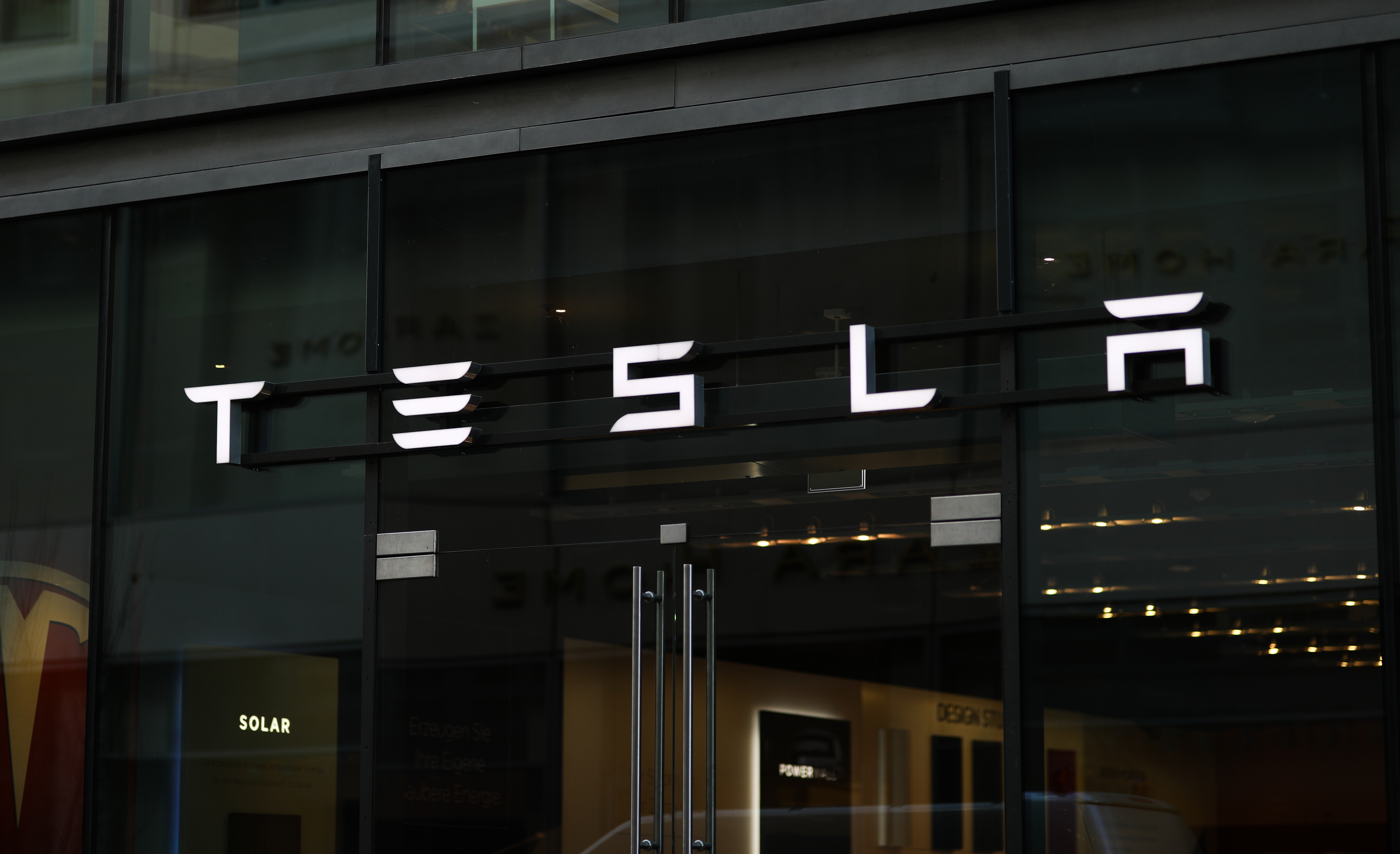 Tesla shares popped nearly 13% on Monday, pushing the stock to record territory.
