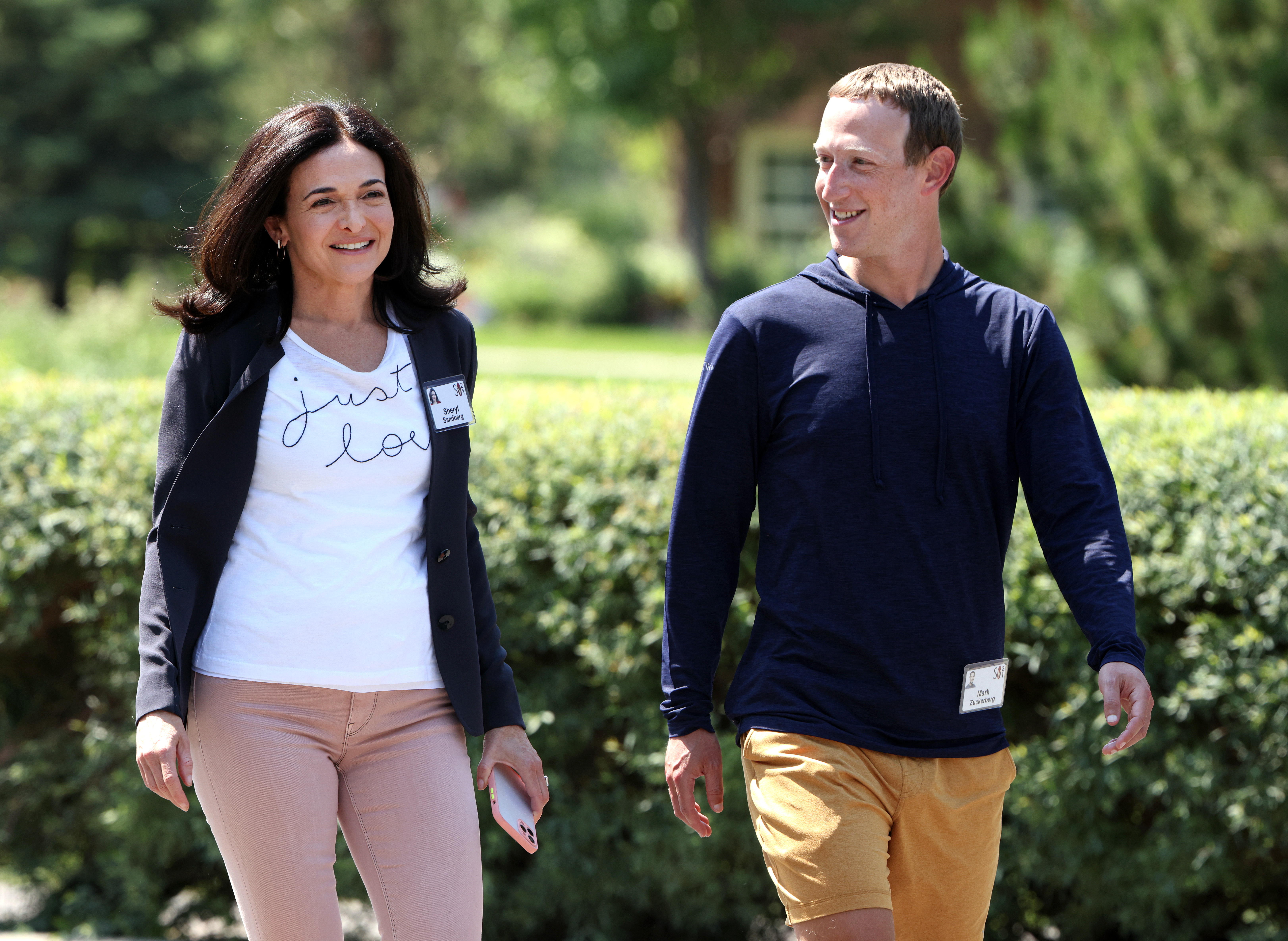 Facebook CEO Mark Zuckerberg walks with company COO Sheryl Sandberg after a session at the Allen & Company Sun Valley Conference on July 8, 2021 in Sun Valley, Idaho.