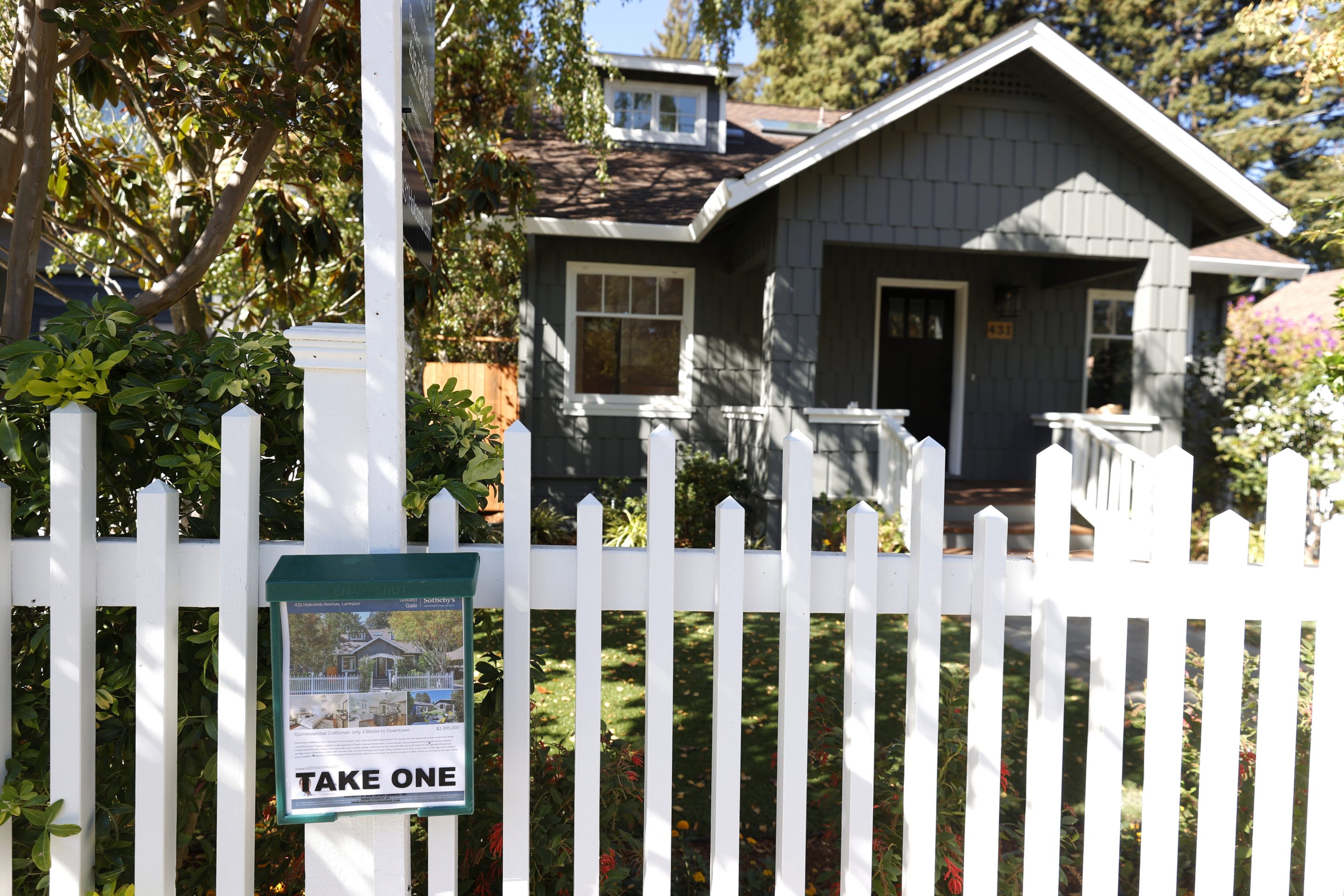 A flyer is posted in front of a home for sale on September 28, 2021 in Larkspur, California.