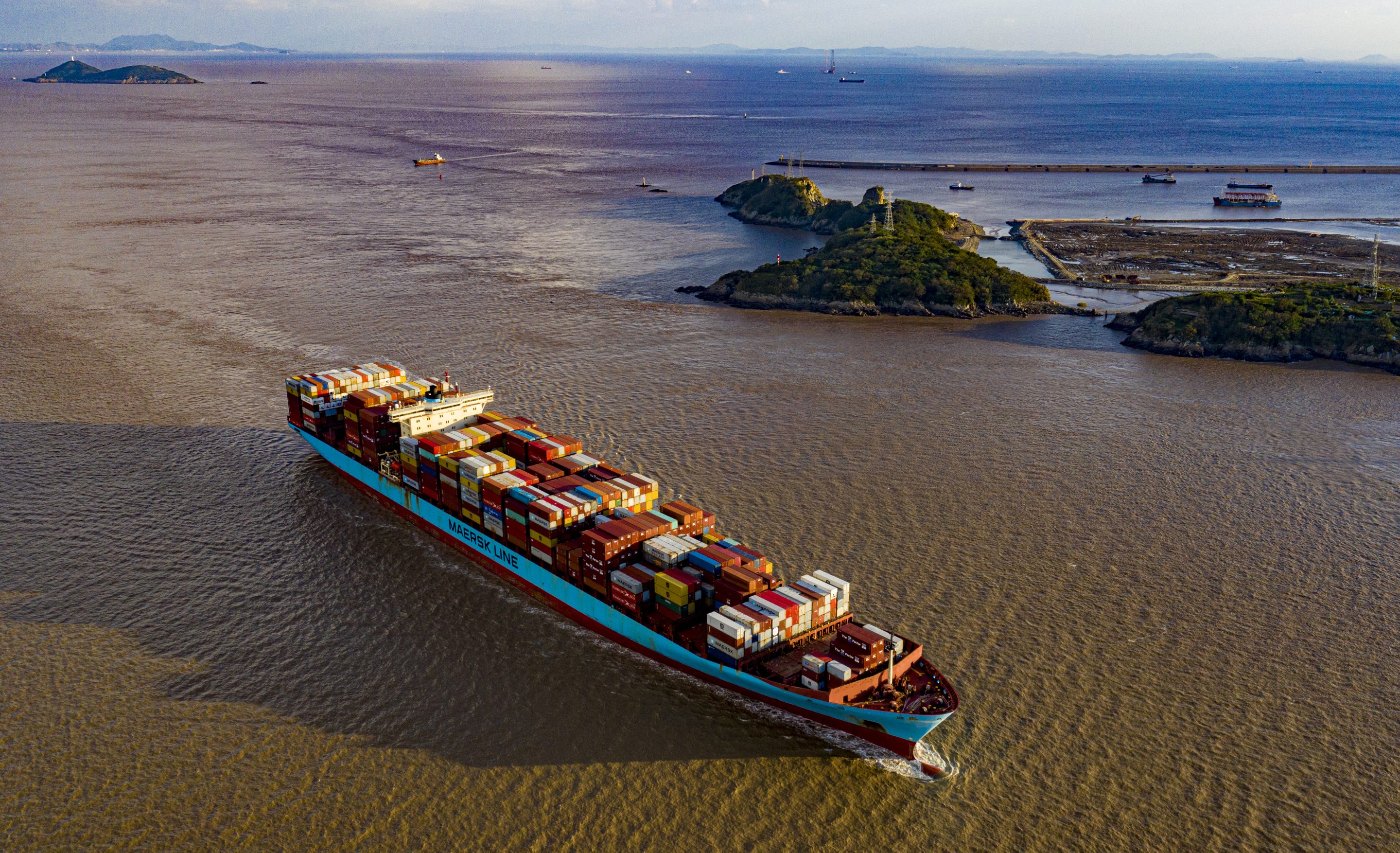 A cargo ship loaded with exhibits for the upcoming 4th China International Import Expo (CIIE) is seen at Yangshan Deepwater Port on October 23, 2021 in Shanghai, China. 