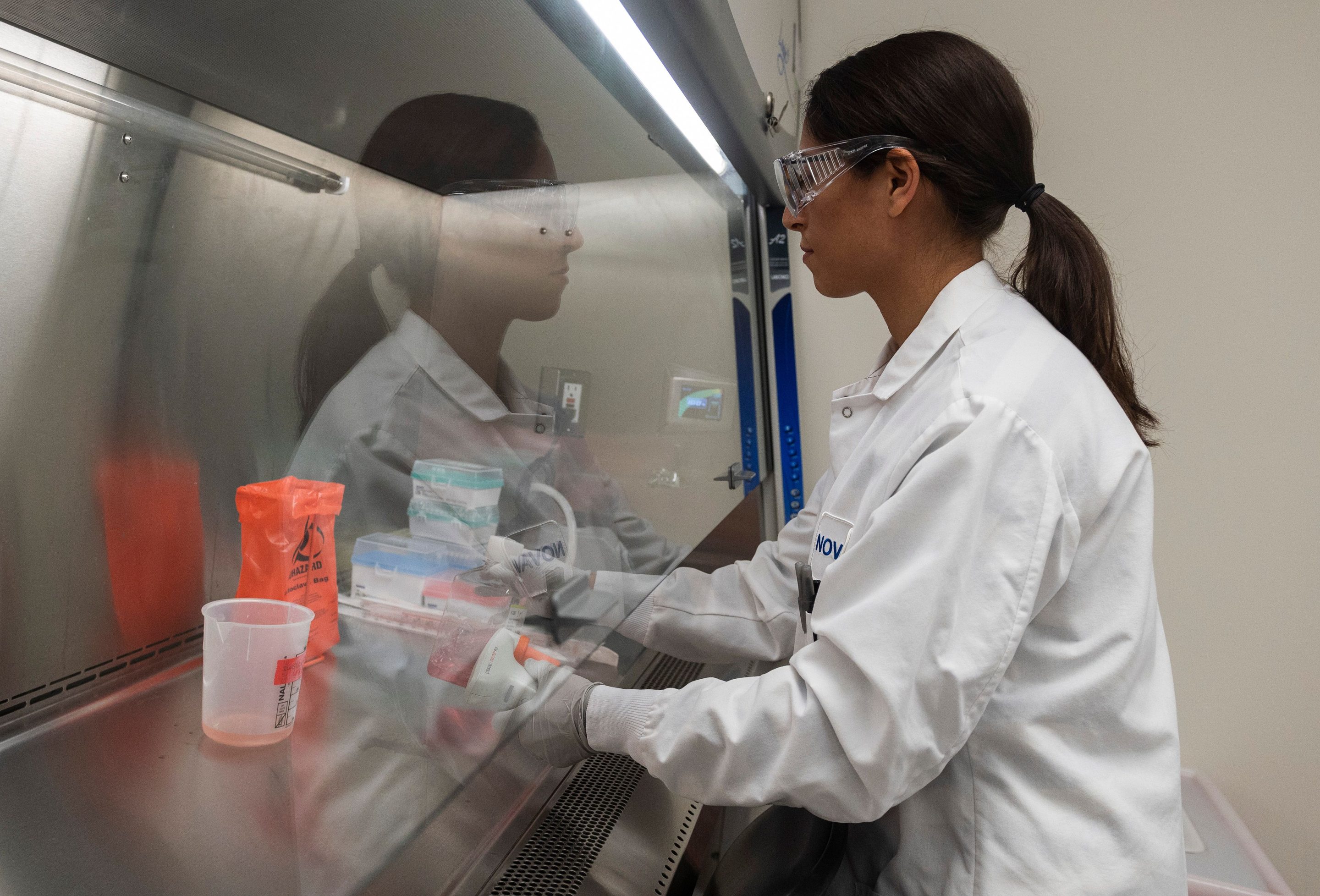 Dr. Sonia Macieiewski samples proteins at Novavax labs in Gaithersburg, Md., on March 20, 2020.