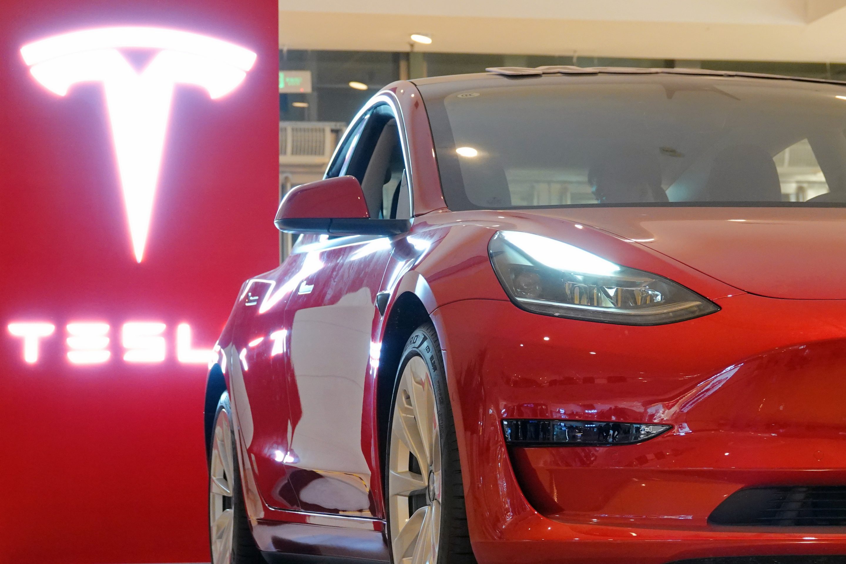 A Tesla Model 3 is displayed at the Tesla Experience store in Joy City, Yantai, East China's Shandong Province, Oct 17, 2021.