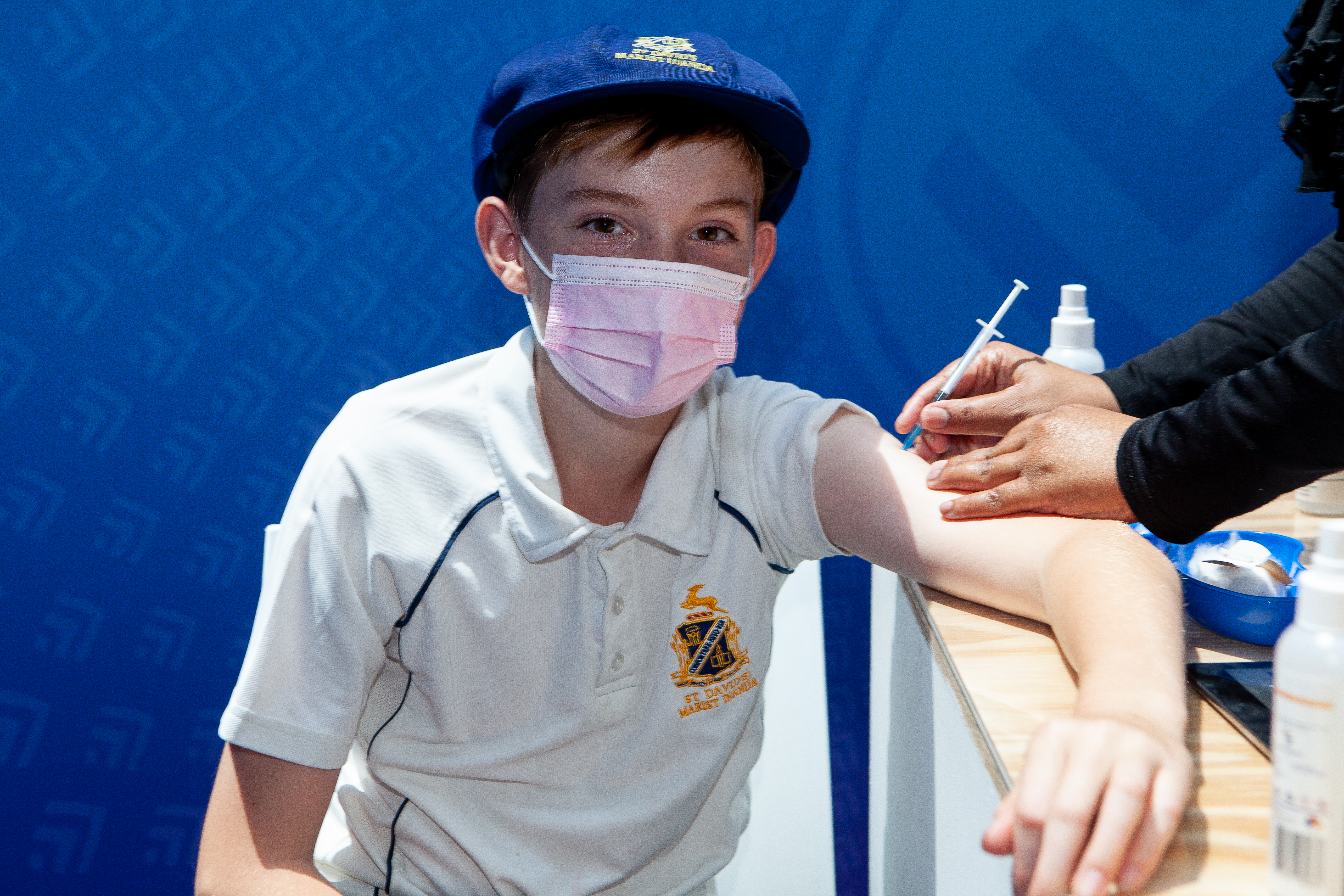 12-17 year-old citizens receive COVID-19 vaccine at Discovery Health vaccination site on October 21, 2021 in Sandton, South Africa.
