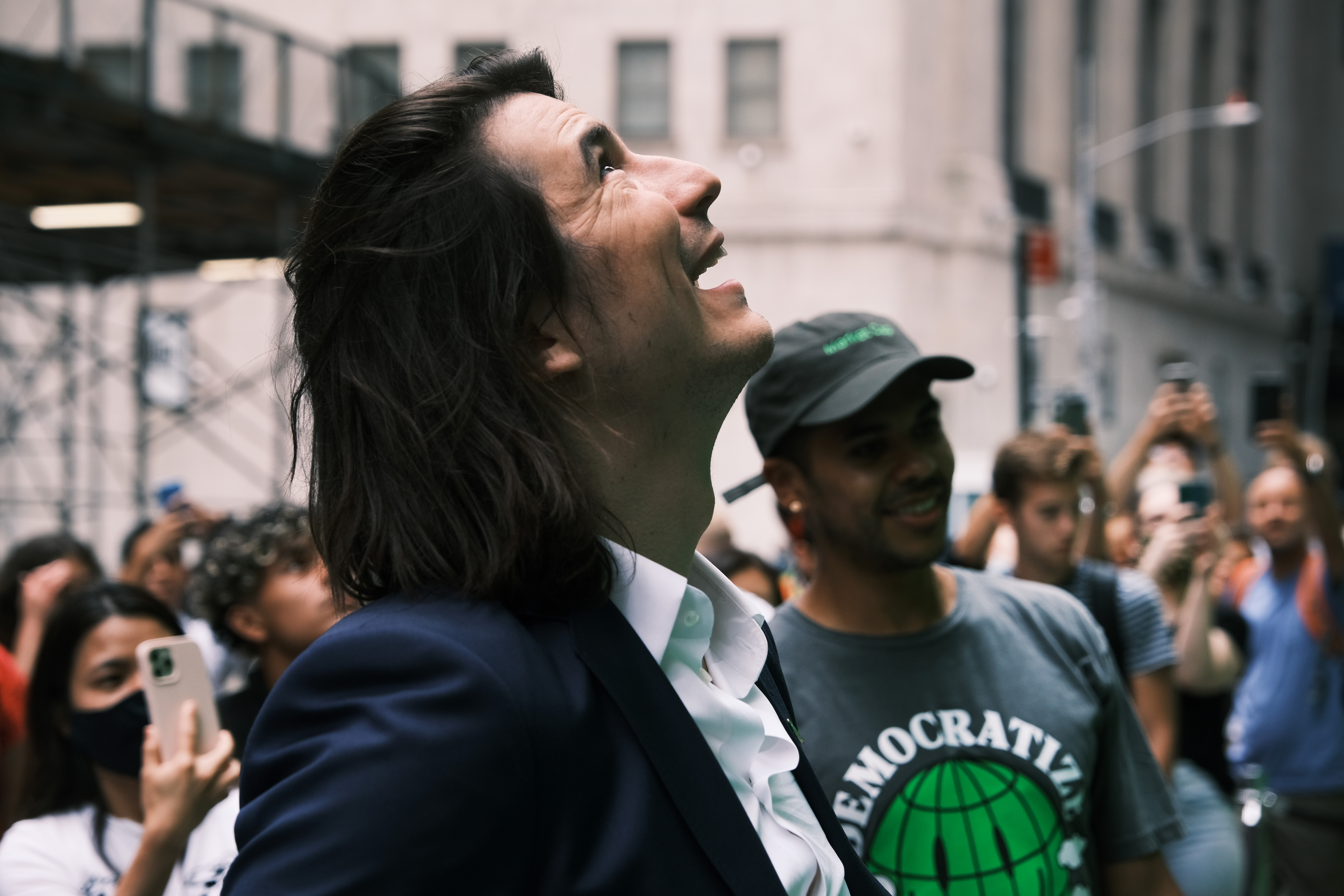Robinhood CEO Vlad Tenev, walks along Wall Street after going public with an IPO earlier in the day on July 29, 2021, in New York City. Robinhood Markets shares fell about 5% during its Nasdaq debut.