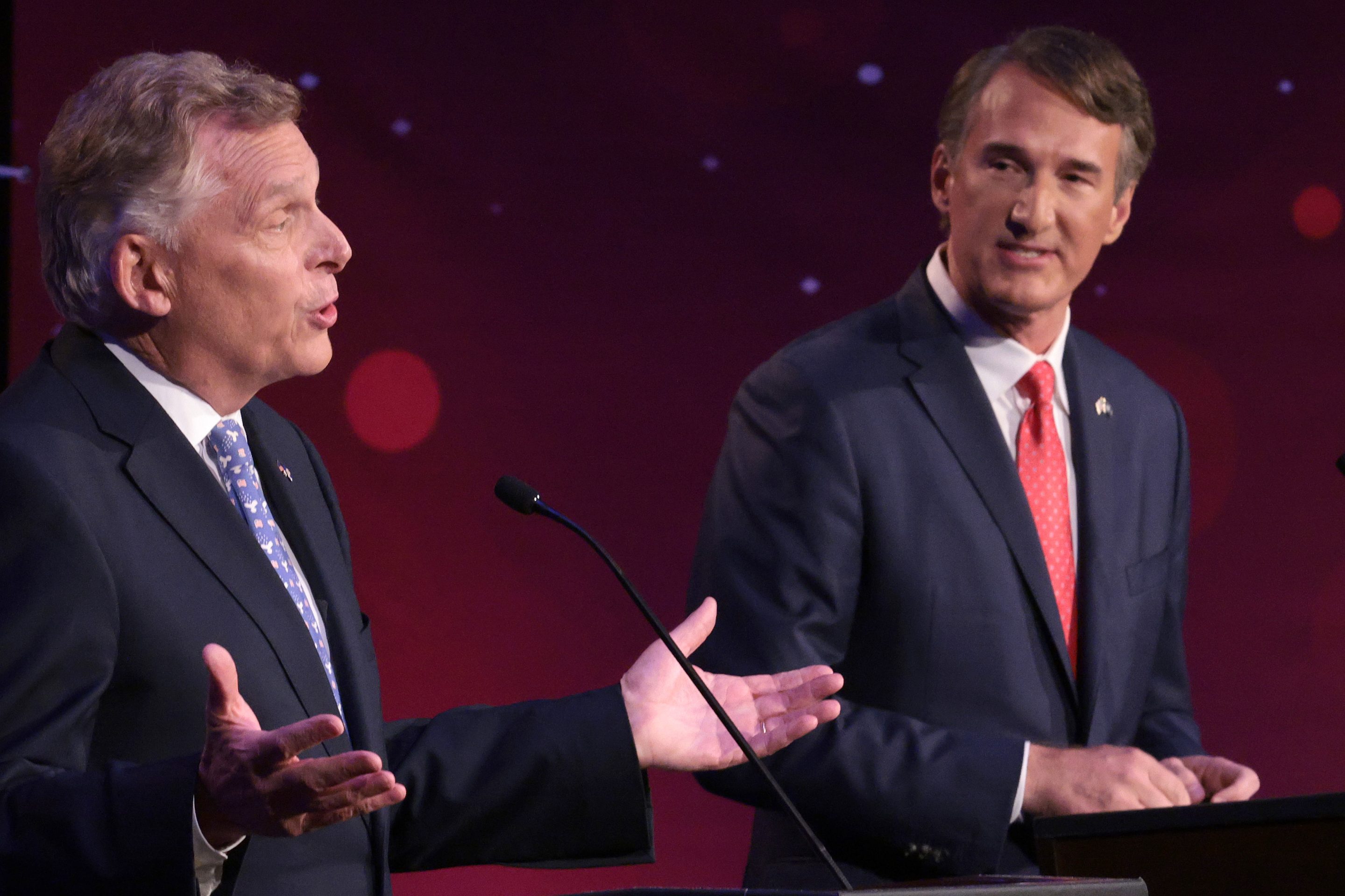 Former Virginia Gov. Terry McAuliffe (D-VA) (L) debates Republican gubernatorial candidate Glenn Youngkin