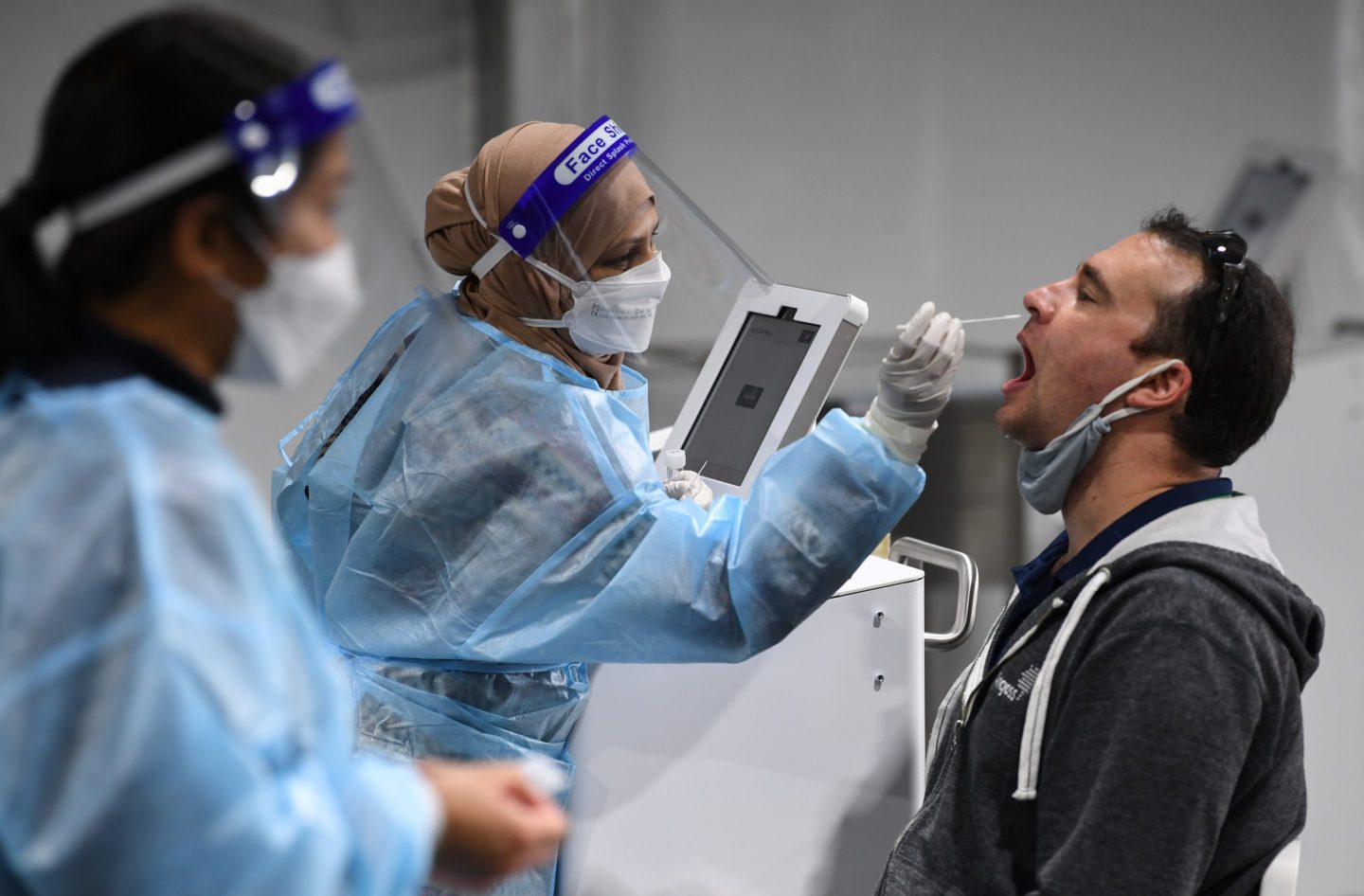 High vaccine rates could limit the economic fallout of Omicron across Asia—but there’s one big caveat