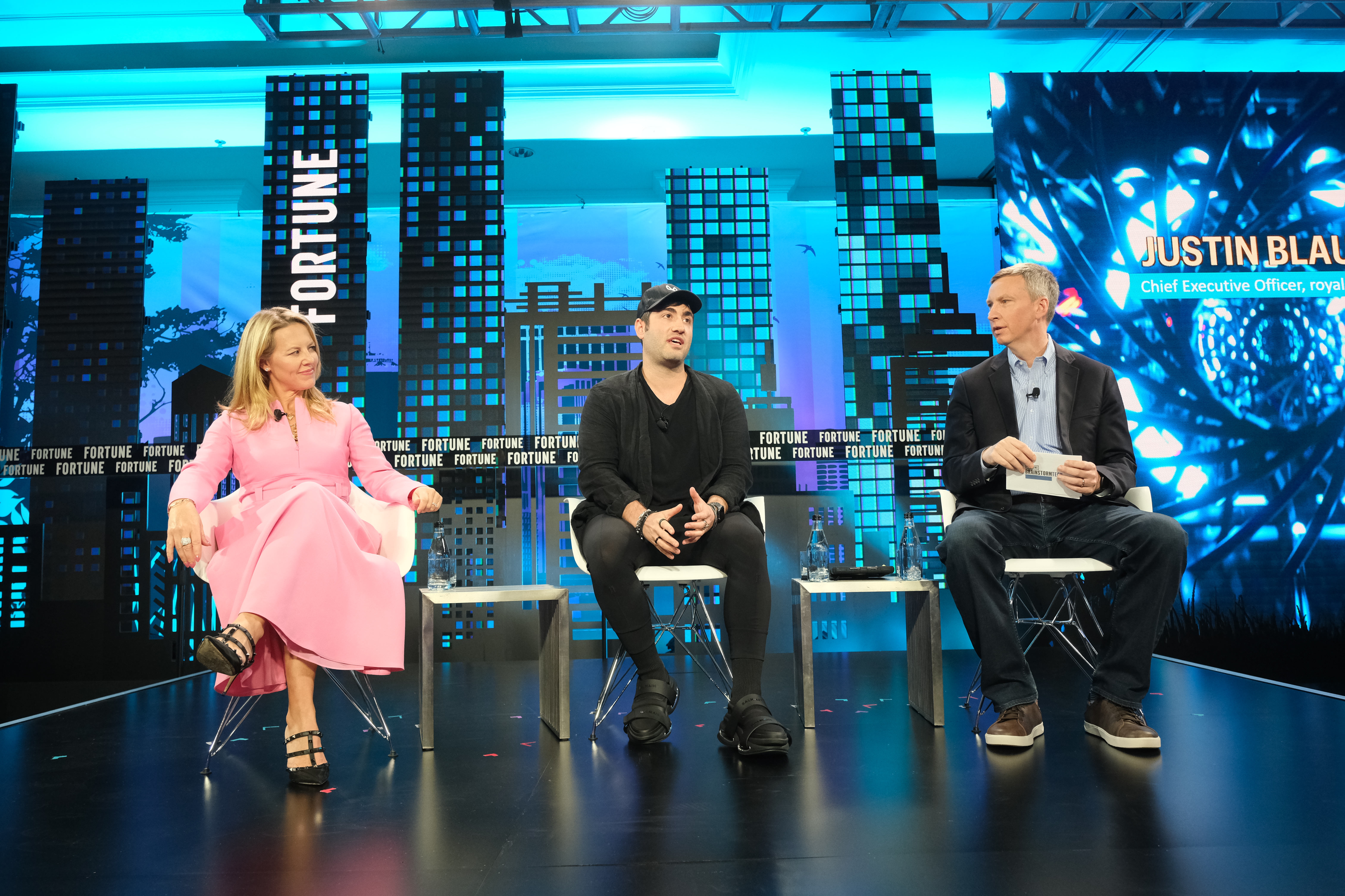 Katie Haun, general partner, Andreessen Horowitz, and Justin Blau, CEO of Royal.io, speak with moderator Brian O’Keefe of Fortune.