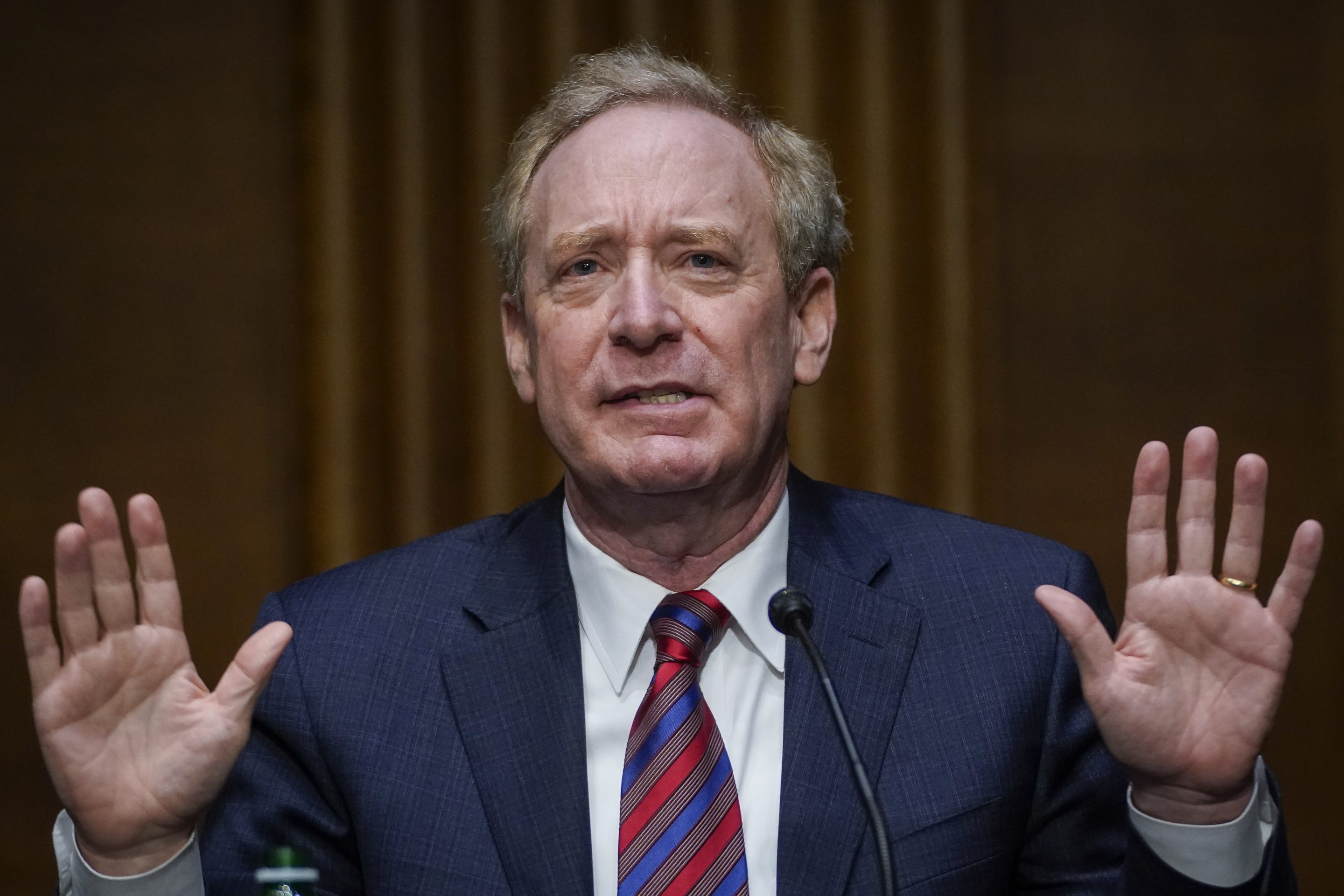 Microsoft president Brad Smith testifies during a Senate Intelligence Committee hearing on the SolarWinds attack on Feb. 23, 2021.