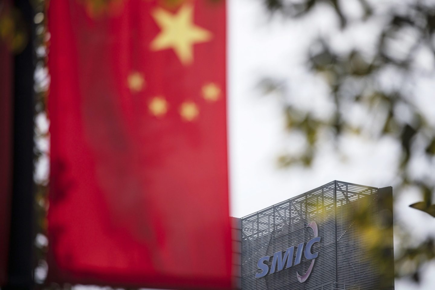 Shares of China’s largest chipmaker sink to lowest close in nearly a year as Biden team considers tougher sanctions