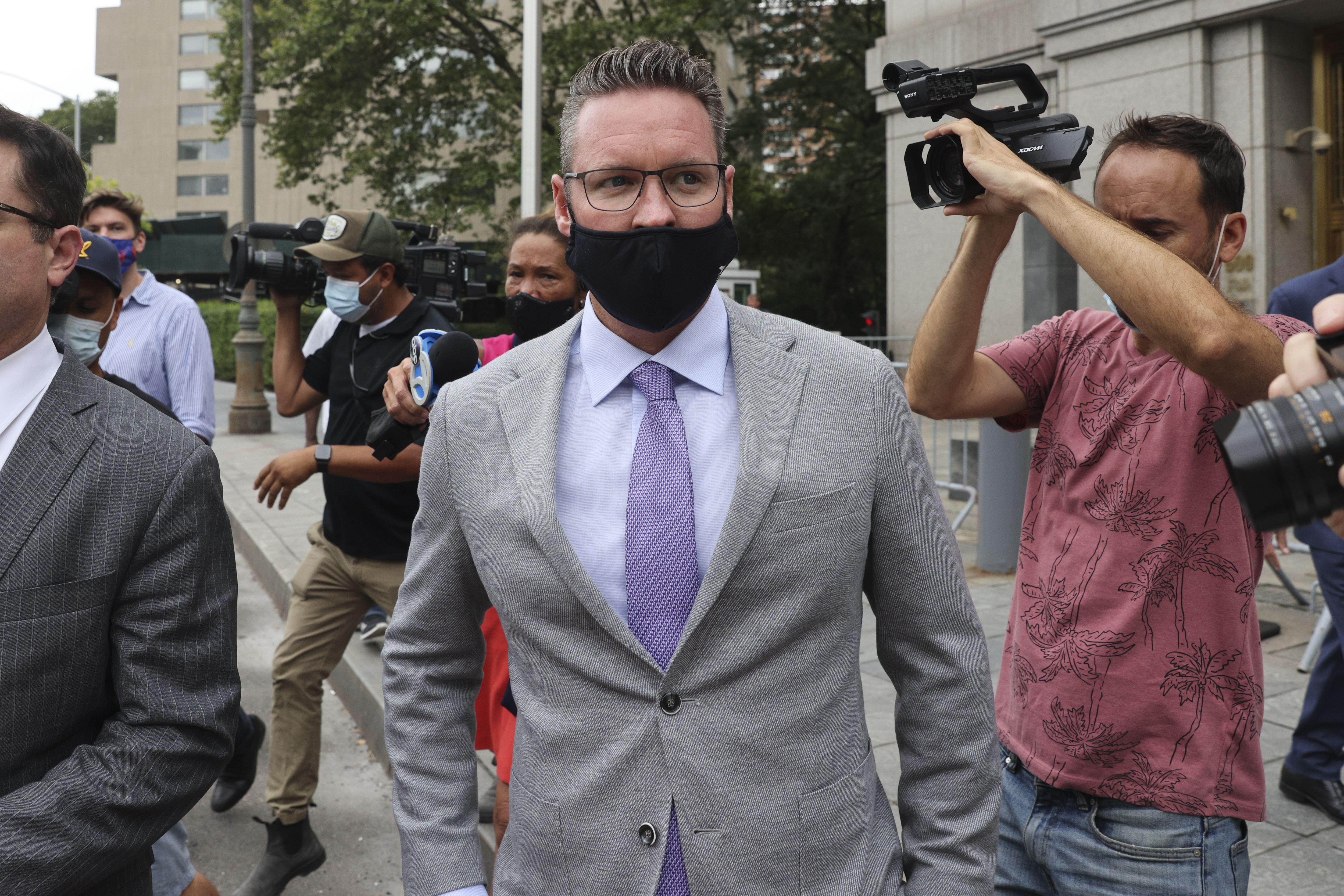 Trevor Milton, founder of Nikola Corp., outside federal court in New York in July 2021. On Tuesday, Nikola settled a $125 million investor fraud case with the Securities and Exchange Commission.