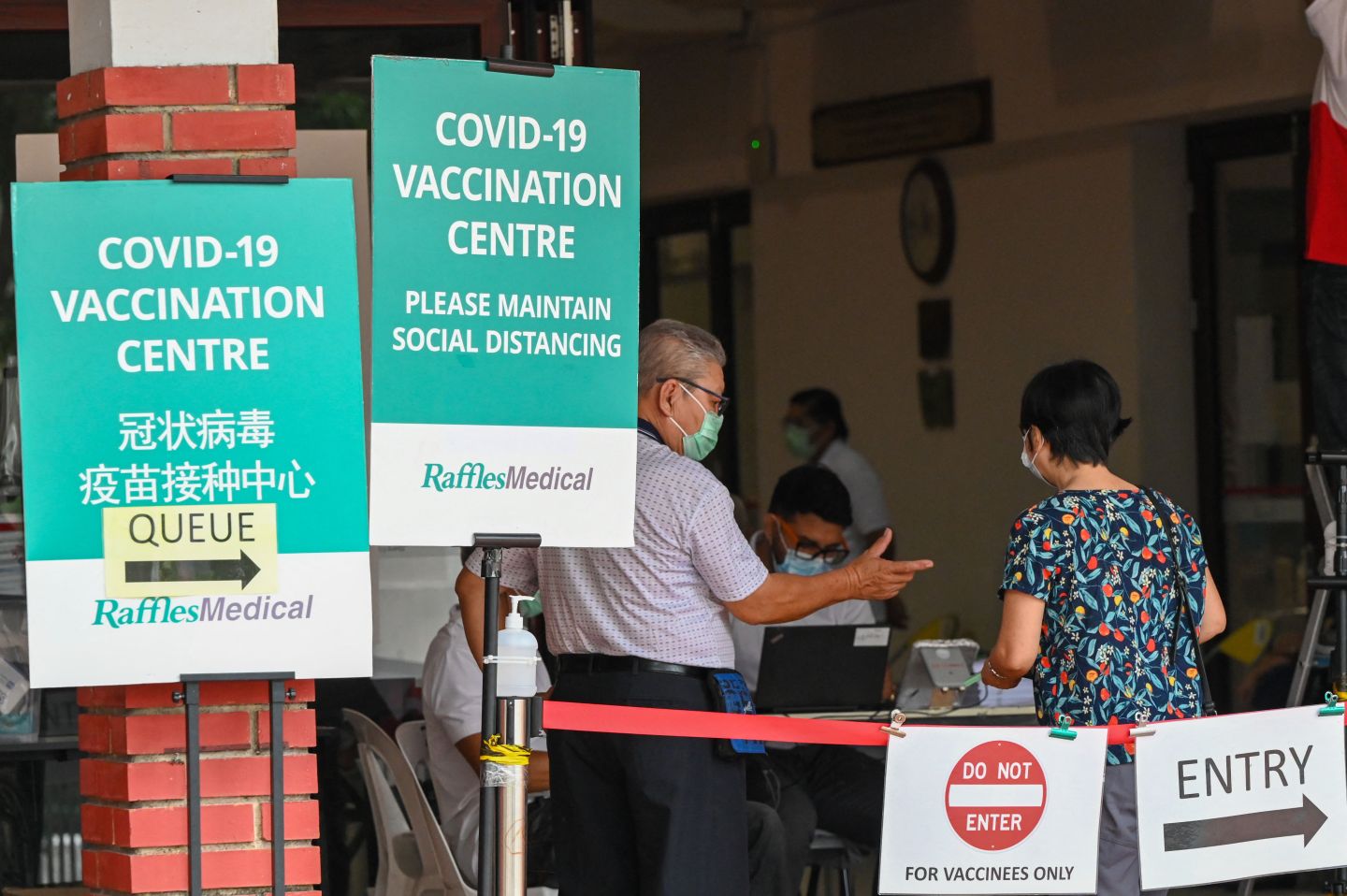 Singapore finds two breakthrough Omicron cases in residents who got COVID booster shots