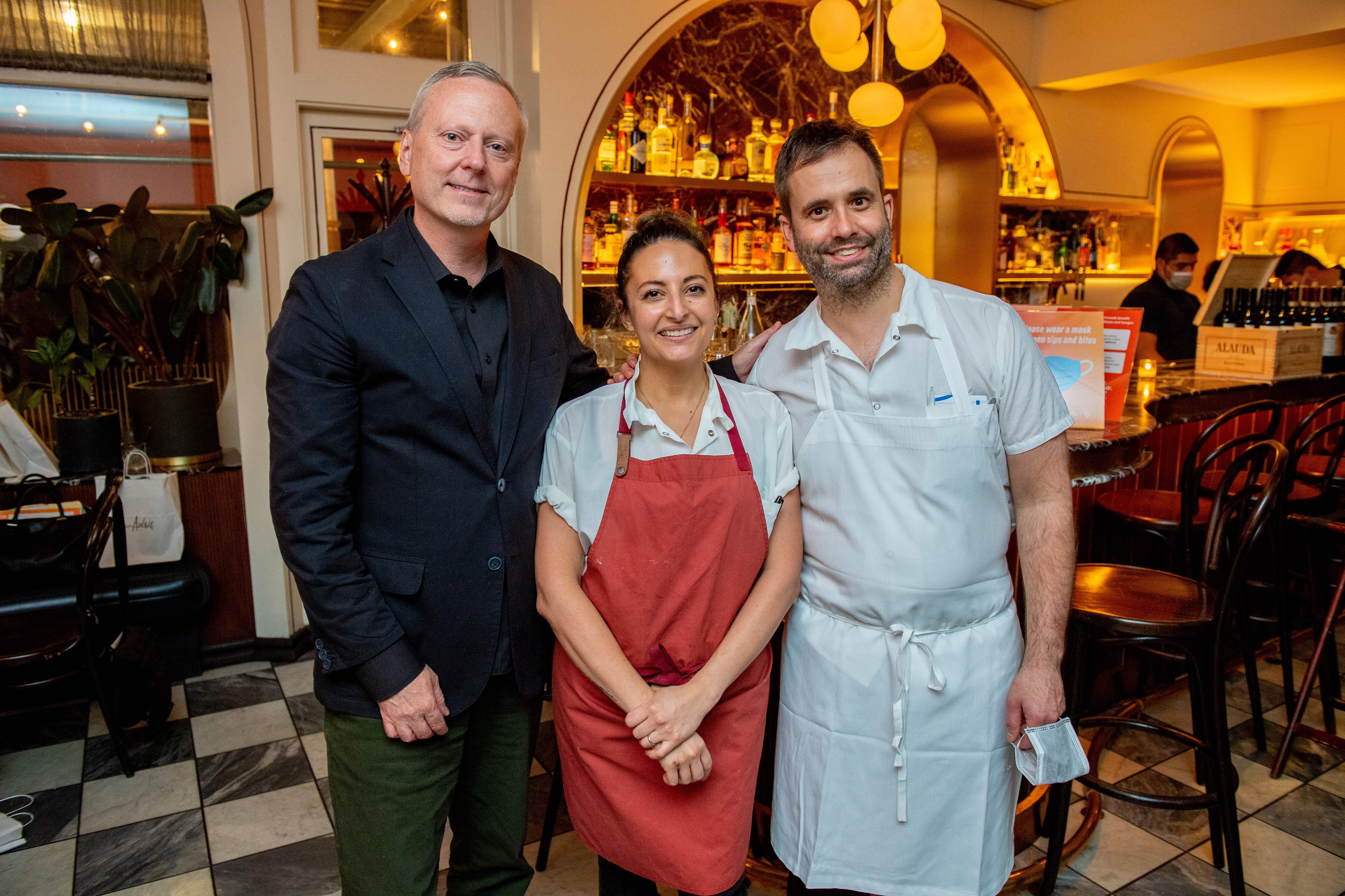 Chefs Angie Rito (c) and chef Scott Tacinelli (r) at Don Angie on Oct. 15, 2021 in New York City.