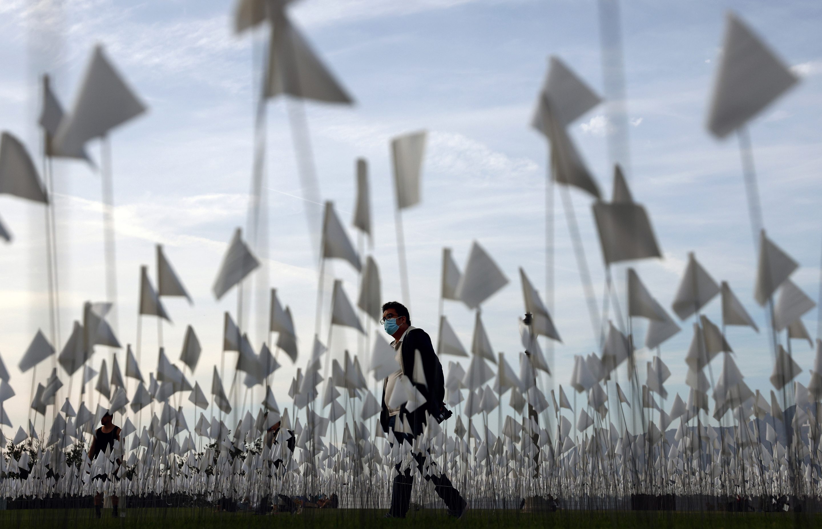 A white flag memorial installation outside Griffith Observatory on Nov. 18 honoring the nearly 27,000 Los Angeles County residents who have died from COVID-19.