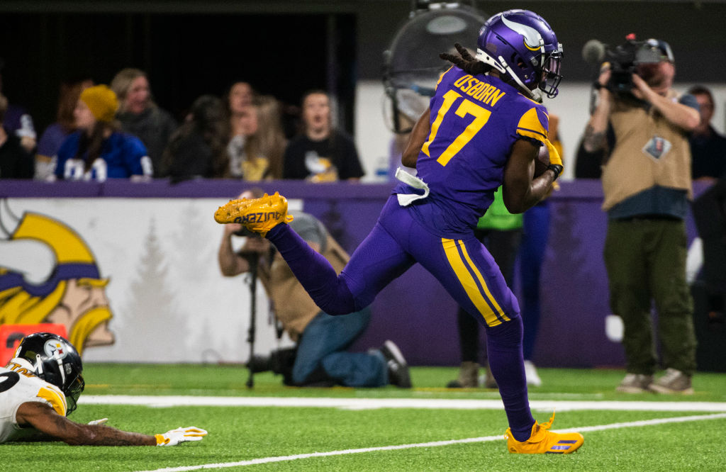 K.J. Osborn #17 of the Minnesota Vikings catches the ball for a 62-yard touchdown in the fourth quarter of the game against the Pittsburgh Steelers at U.S. Bank Stadium on December 9, 2021 in Minneapolis, Minnesota.
