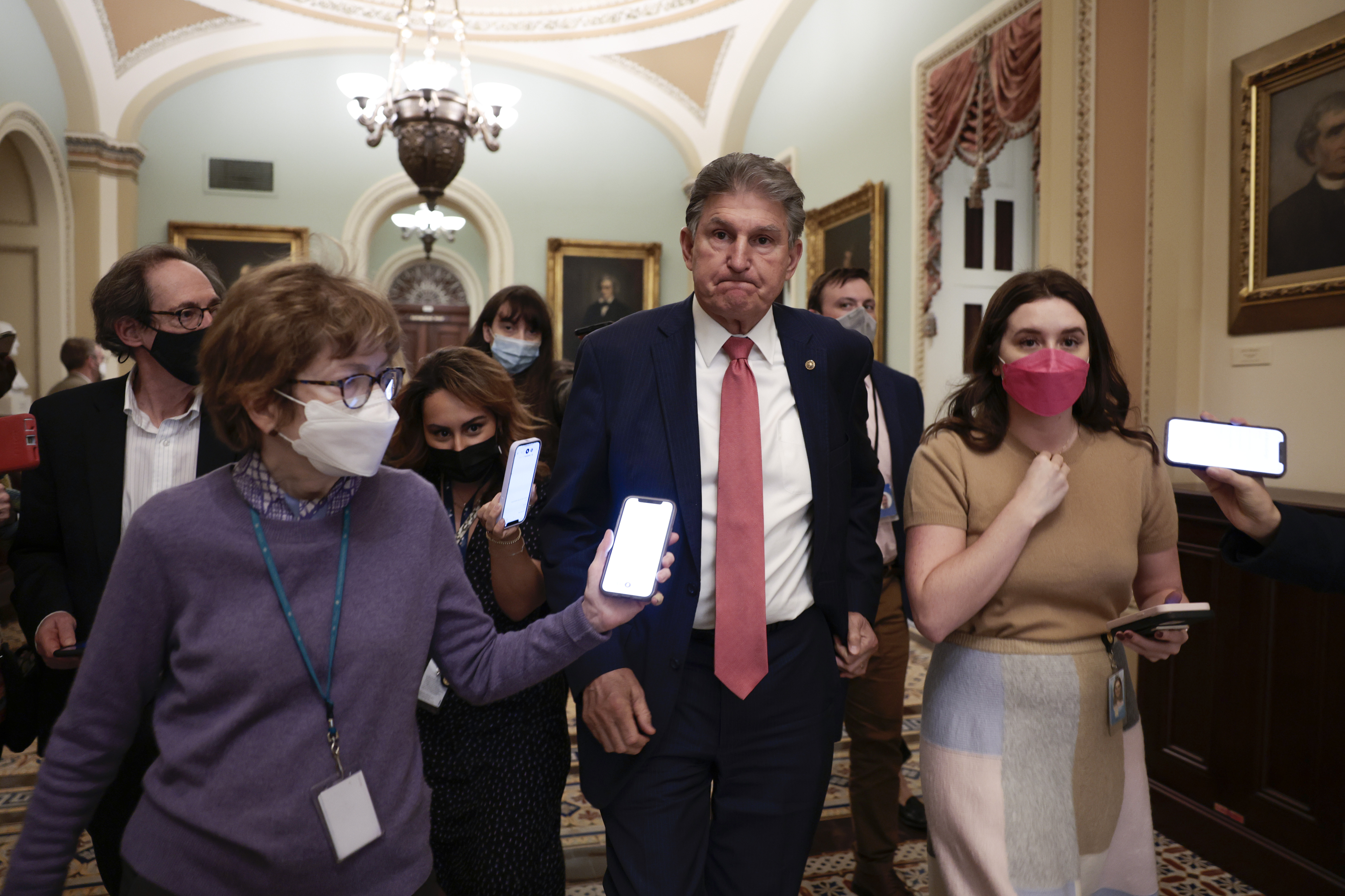 Senator Joe Manchin stunned the White House and fellow Democrats Sunday by announcing his opposition to a tax-and-spending package tailored to win his support after months of courtship by Biden and other administration officials.