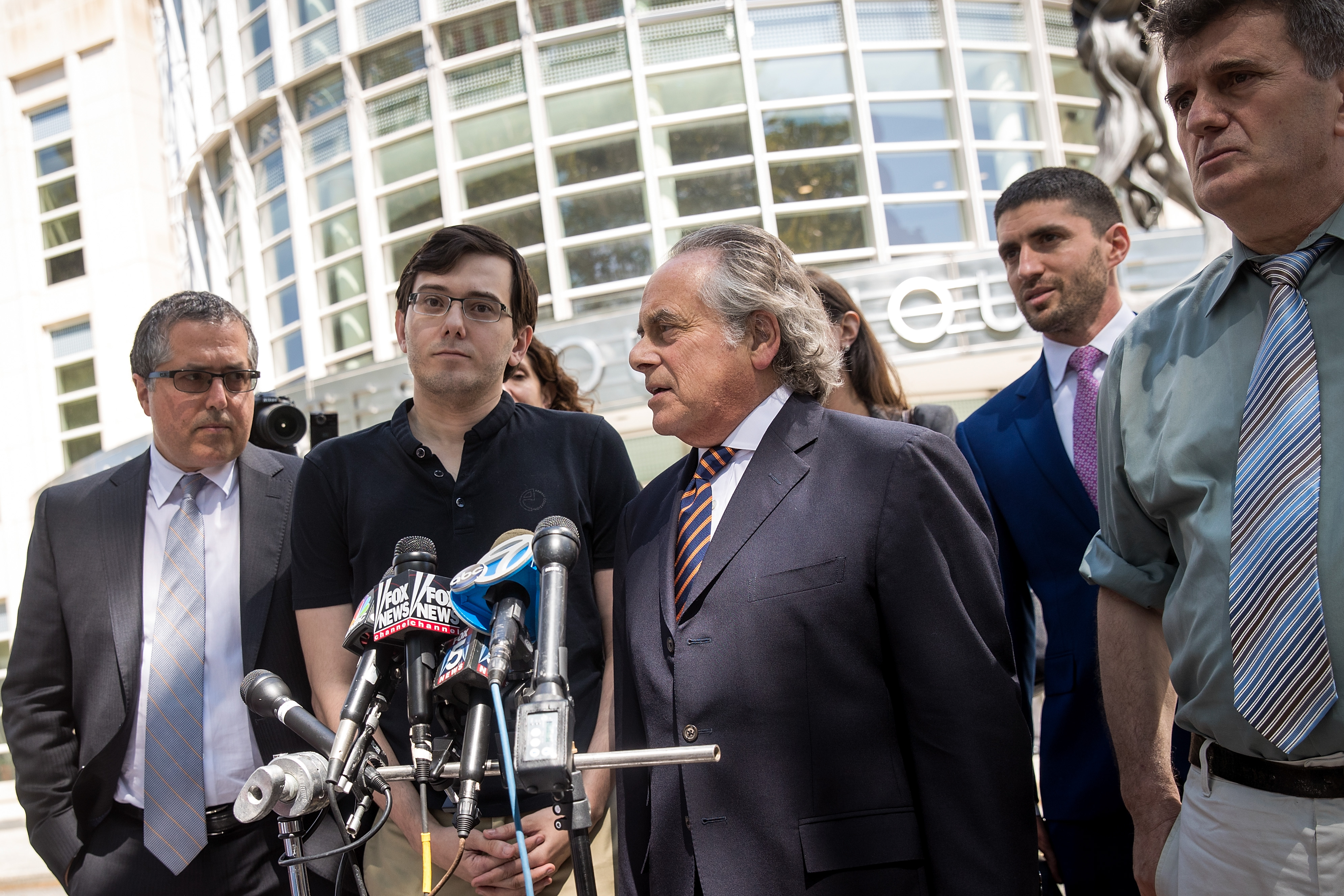 'Pharma Bro' Martin Shkreli and lead defense attorney Benjamin Brafman speak to the press after the jury issued a verdict at the U.S. District Court for the Eastern District of New York, Aug. 4, 2017.