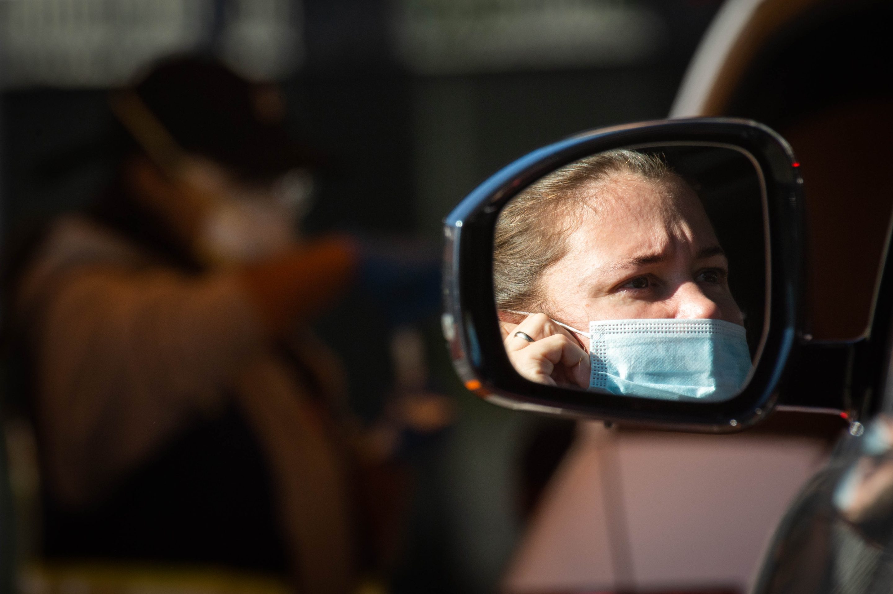 People are tested for COVID-19 at 911 COVID Testing drive-thru on Wednesday, January 5, 2022 near the Getty Center in Los Angeles where a teenage boy tested positive for "Flurona."