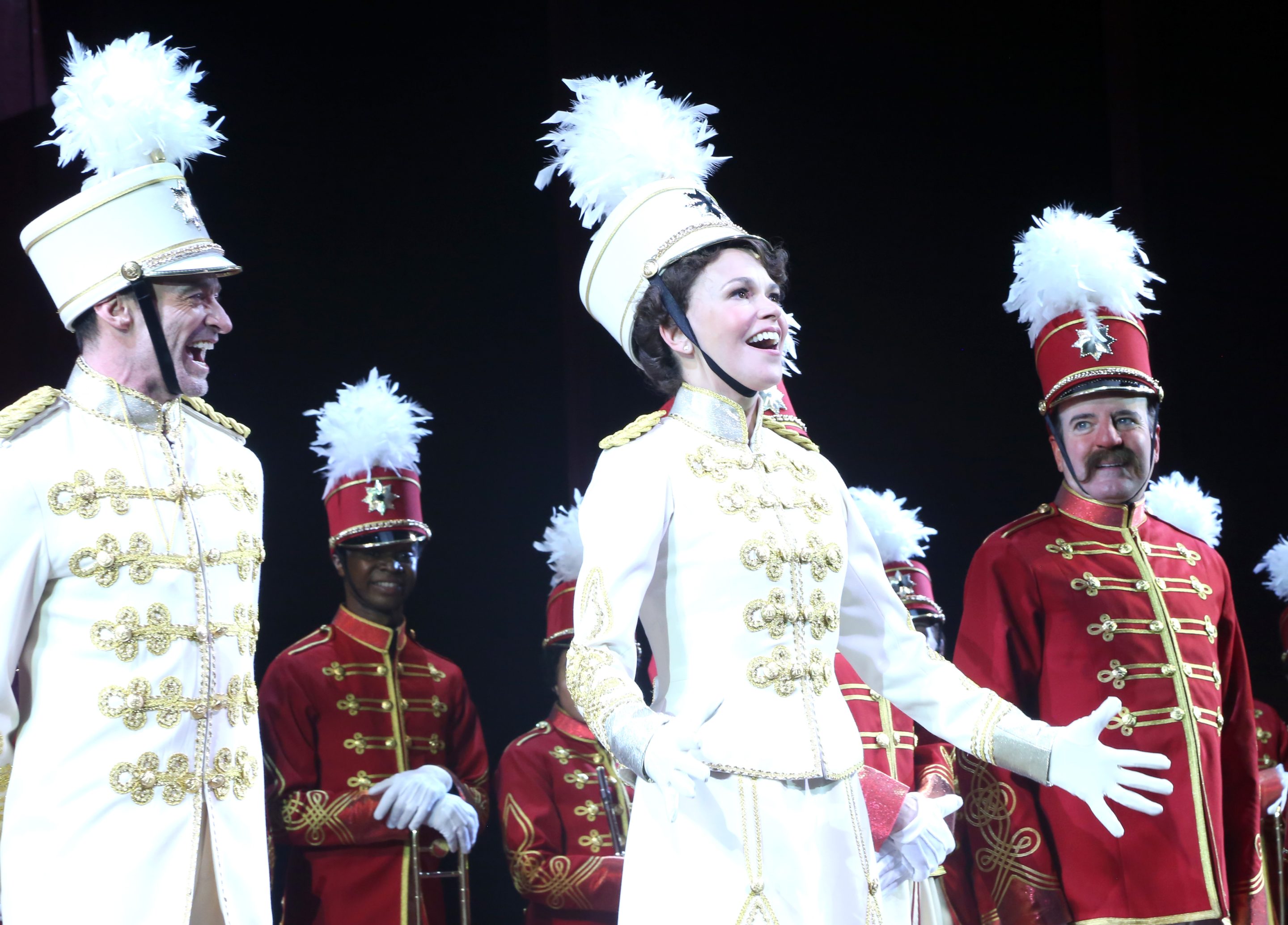 Hugh Jackman as "Harold Hill", Sutton Foster as "Marian Paroo" and Jefferson Mays as "Mayor George Shinn" during the curtain call as they resume performances of "The Music Man" on Broadway at The Winter Garden Theater on January 6, 2022 in New York City.