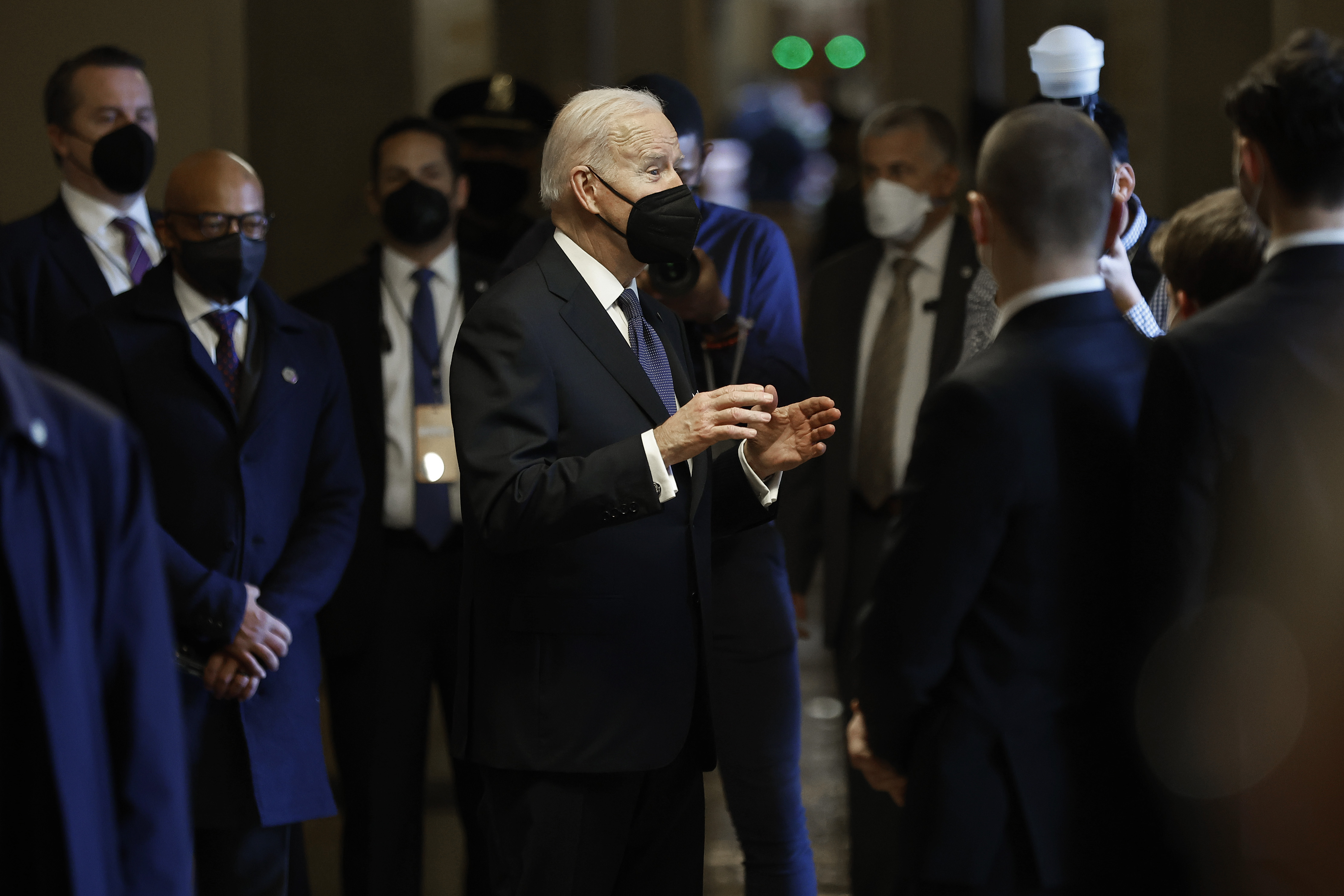 President Joe Biden visits with members of the Senate Page program after paying respects to former Senate Majority Leader Harry Reid as he lies in state in the U.S. Capitol on Jan. 12, 2022 in Washington, DC.