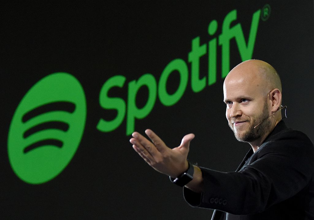 Spotify CEO Daniel Ek says the streaming platform will add content advisory labels to podcasts that discuss COVID-19, following backlash from musicians and health care professionals.