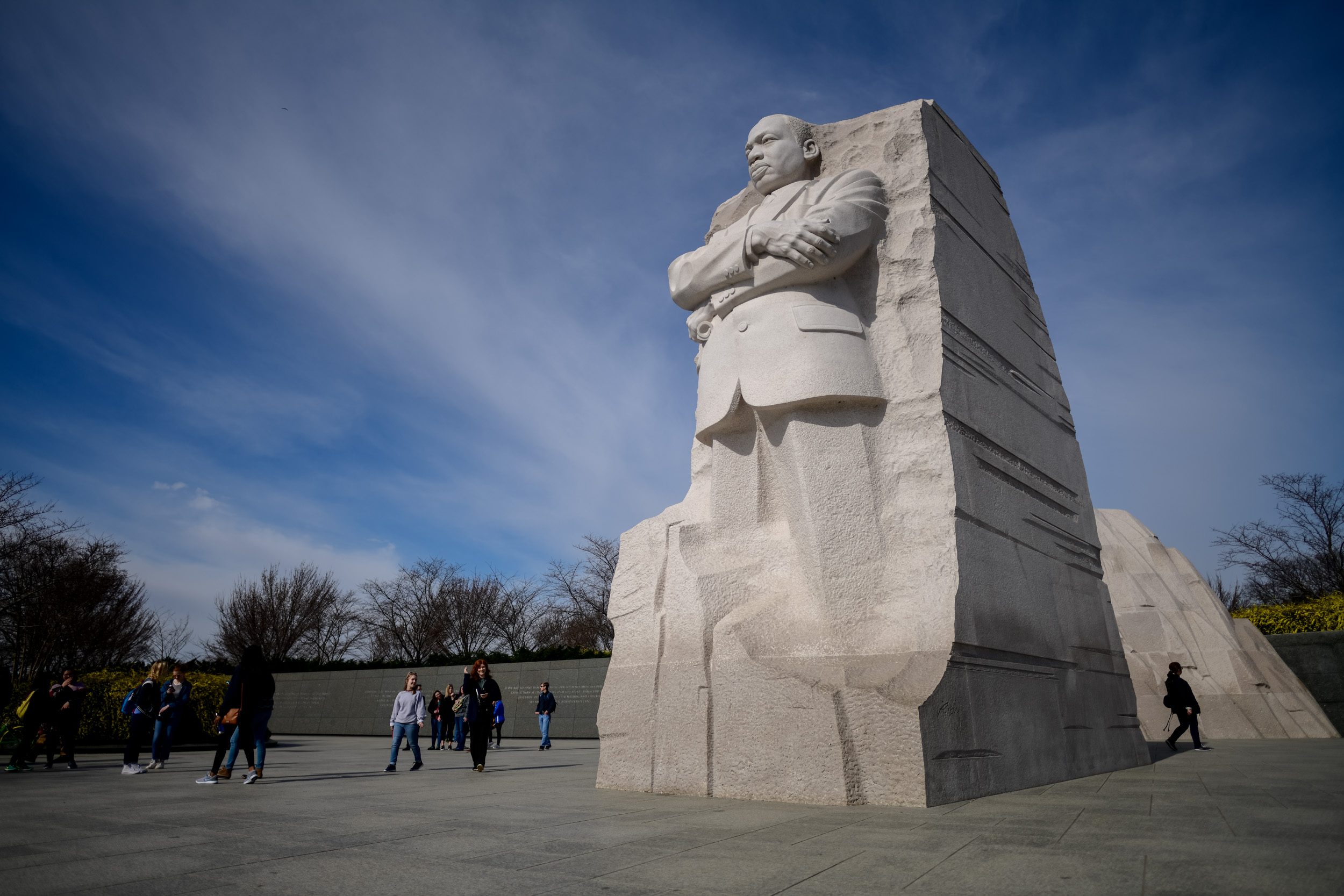 Visitors walk next to the Martin Luther King Jr. Memorial in Washington, D.C.