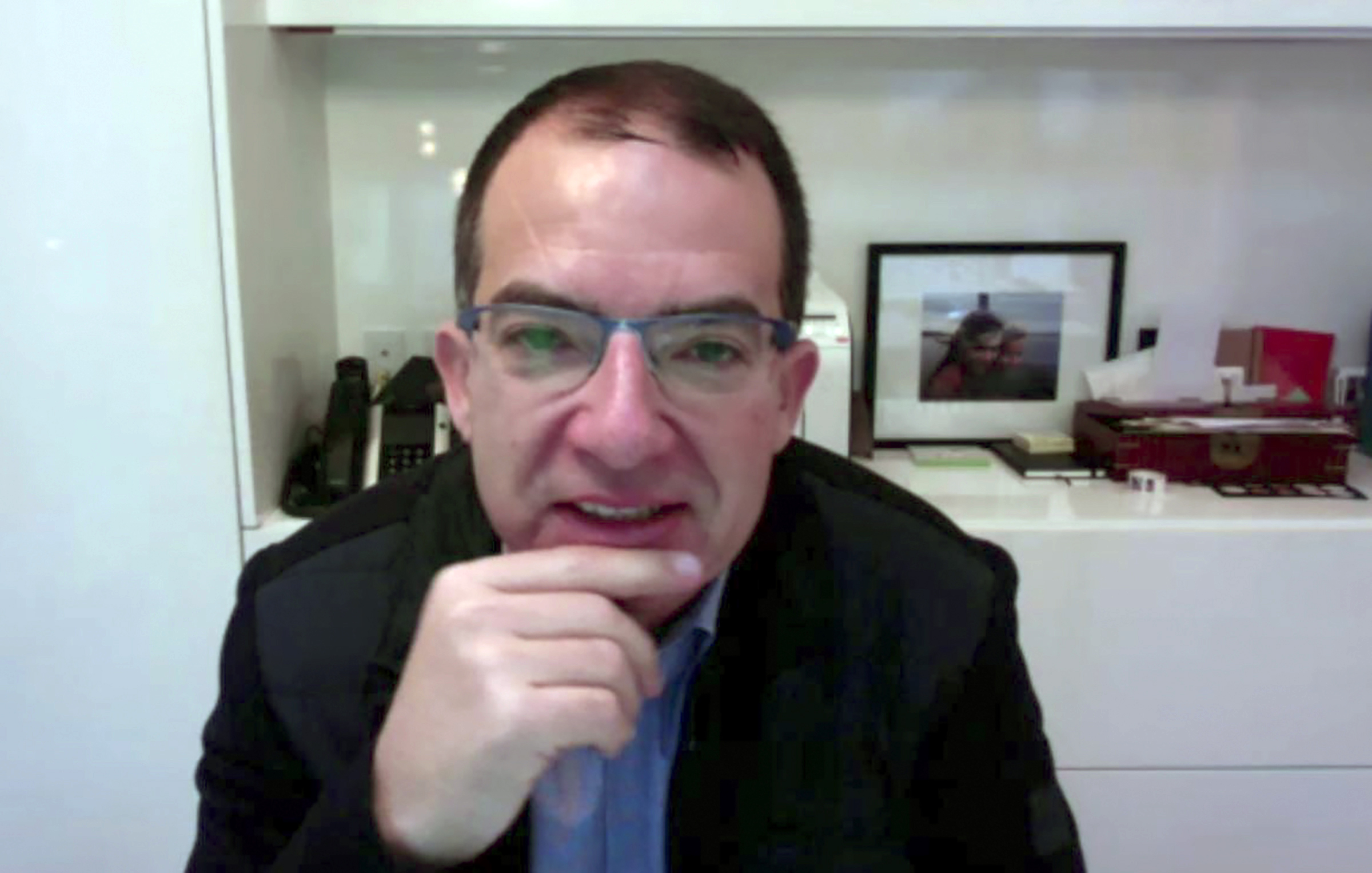 The CEO of Moderna Stéphane Bancel is seen in this video frame grab as he speaks during an interview with AFP on November 17, 2020.