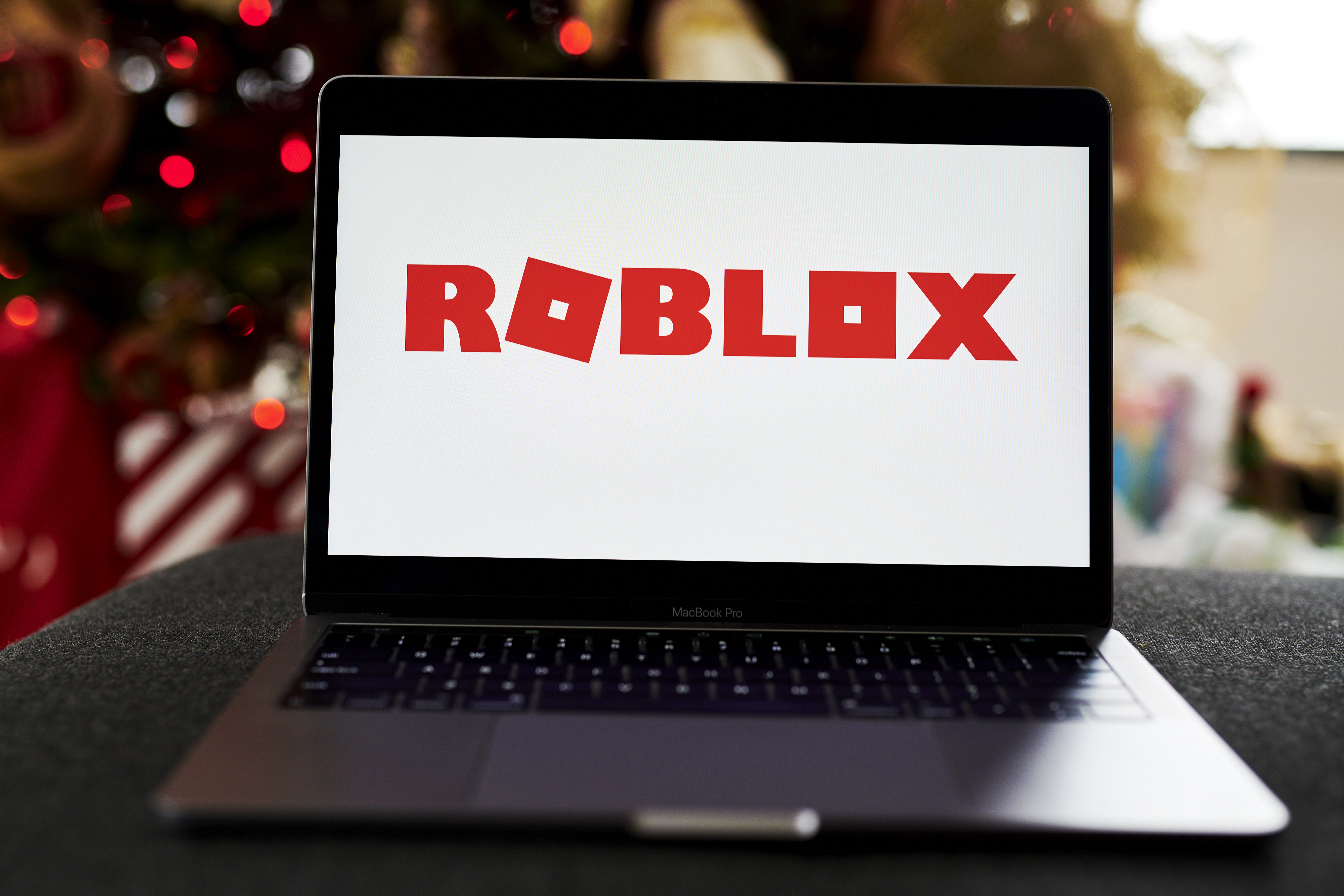 Roblox signage on a laptop computer. Shares in the gaming platform were tumbling premarket on Wednesday, another hit to so-called metaverse stocks.