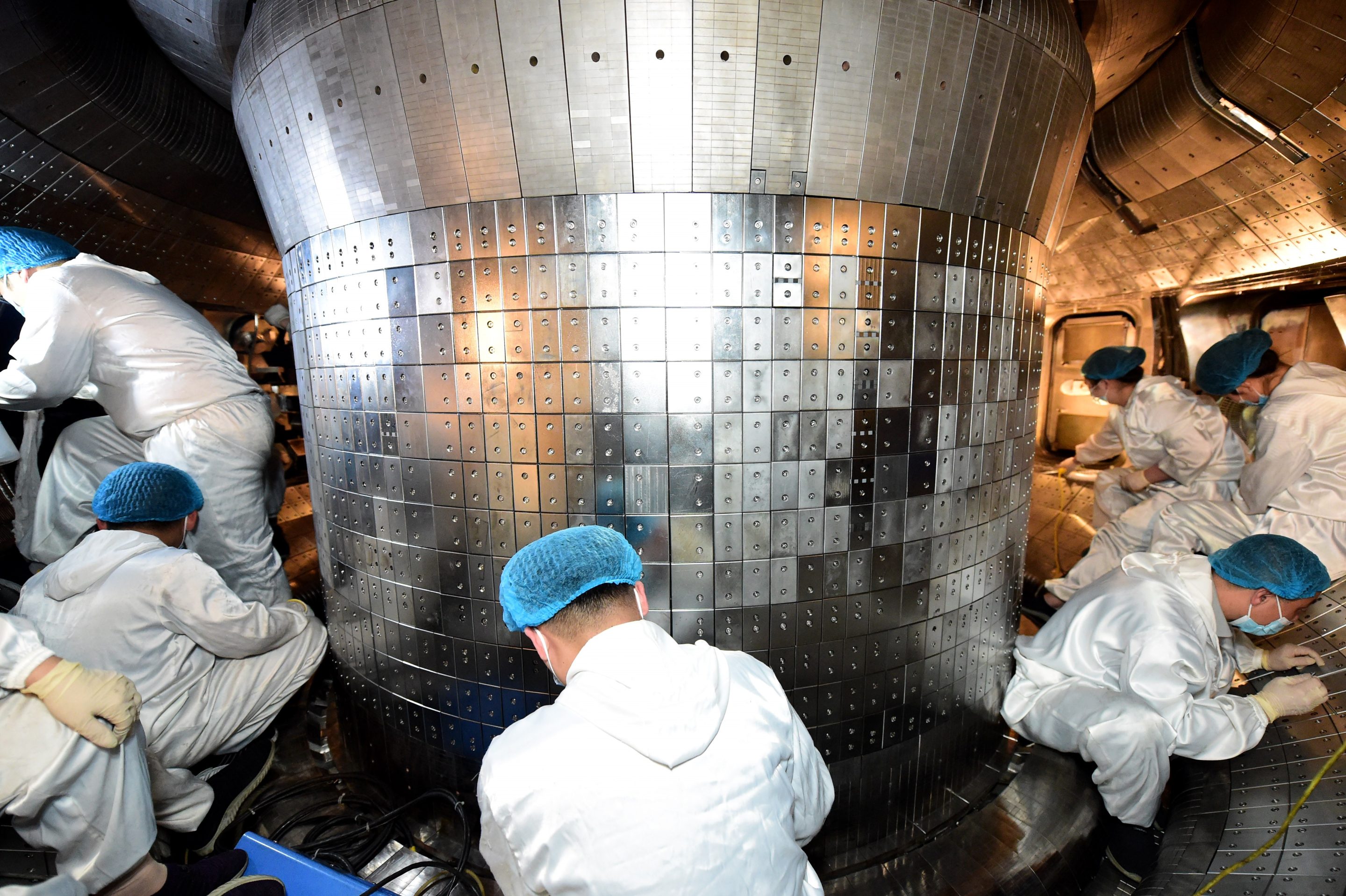 London-based A.I. company DeepMind has created an A.I. system that can control the magnetic fields that hold superheated plasma in place inside a nuclear fusion reactor, called a tokamak, such as this one in China, pictured here.