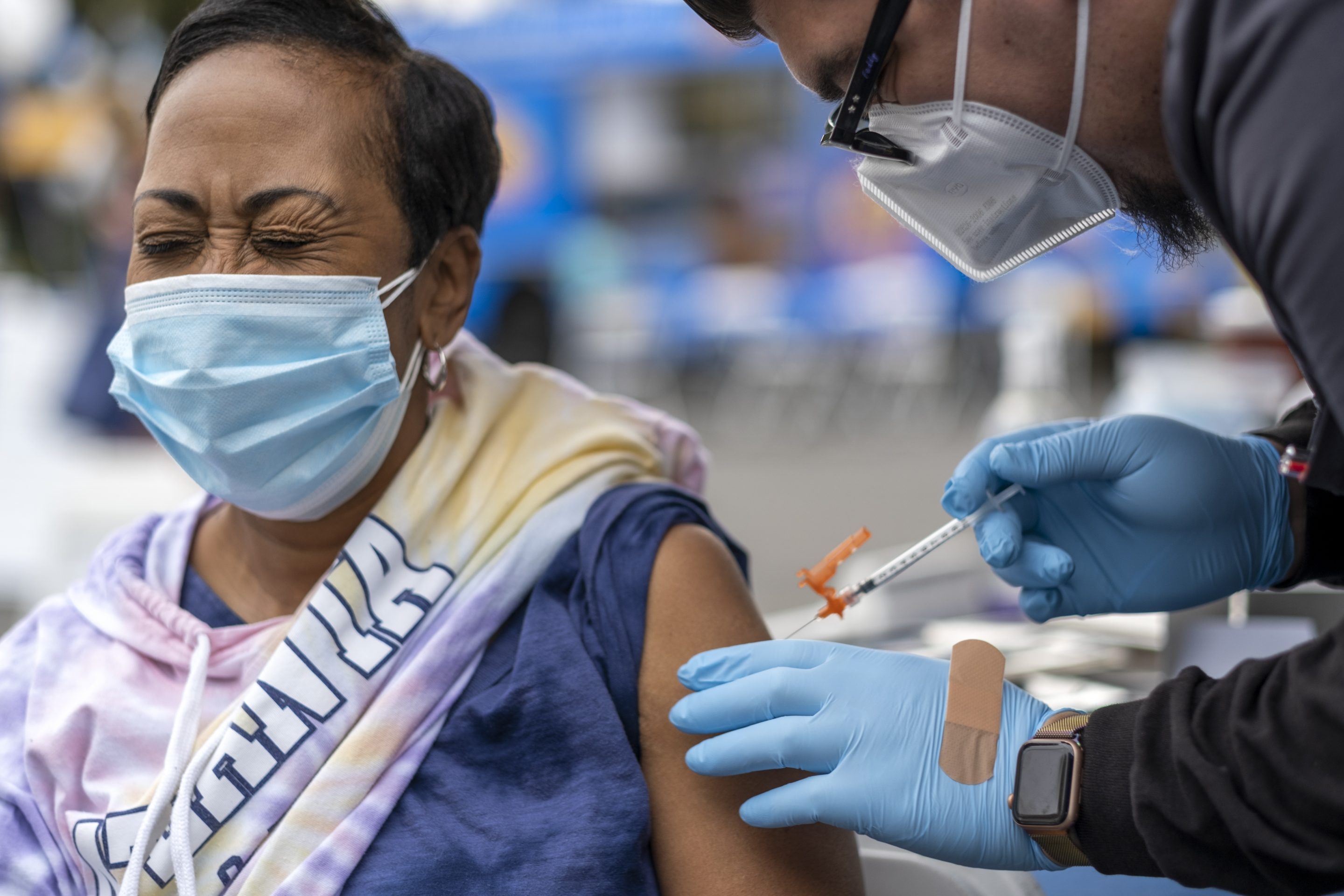 A woman getting a COVID-19 vaccination shot in Los Angeles, CA in January 2022. Will we need a 4th shot?