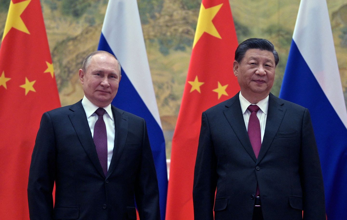 Russian President Vladimir Putin, left, and Chinese President Xi Jinping, right.