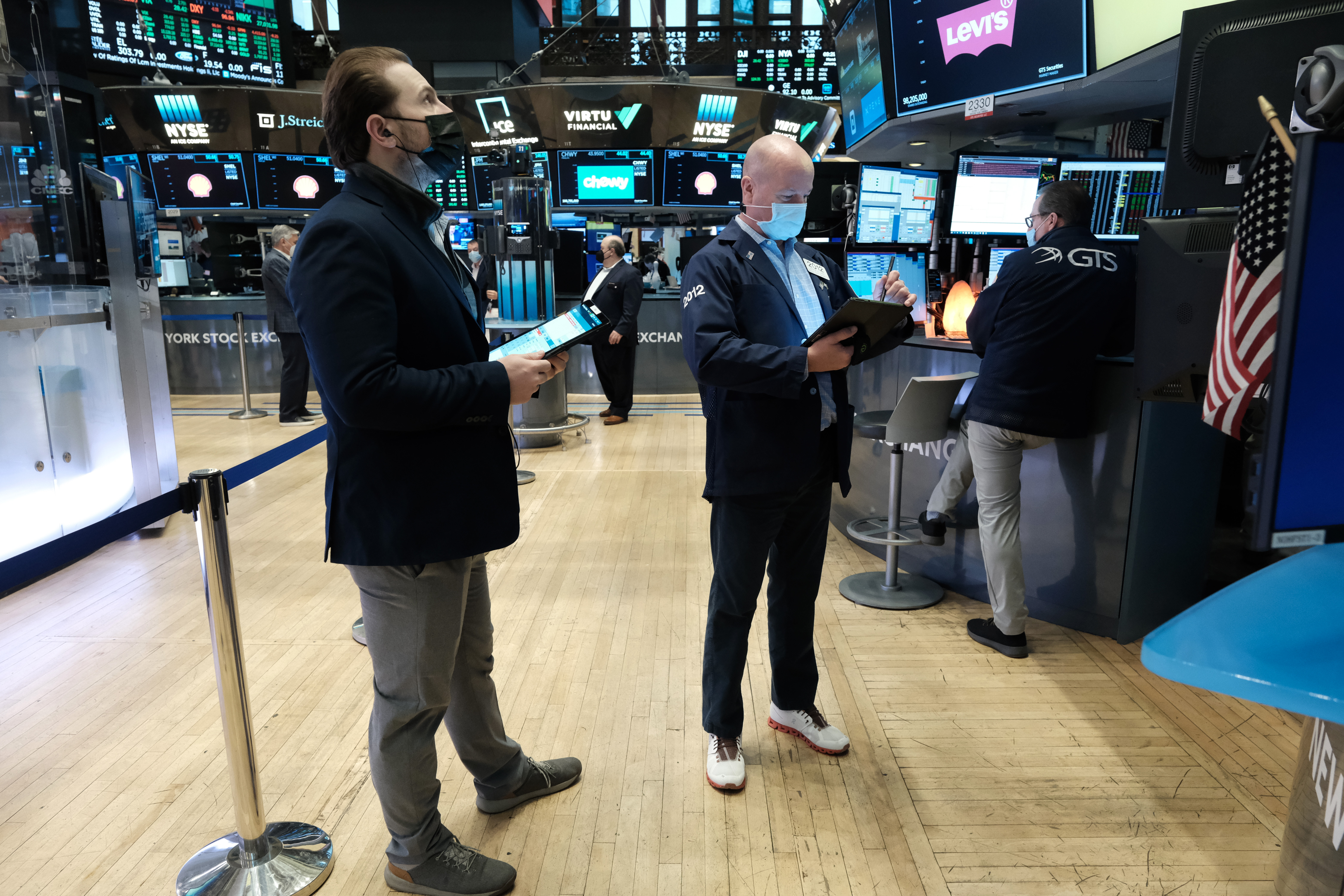 Traders work on the floor of the New York Stock Exchange in New York City. Tech futures are popping again on Wednesday. Over in crypto land, it’s one big snooze.