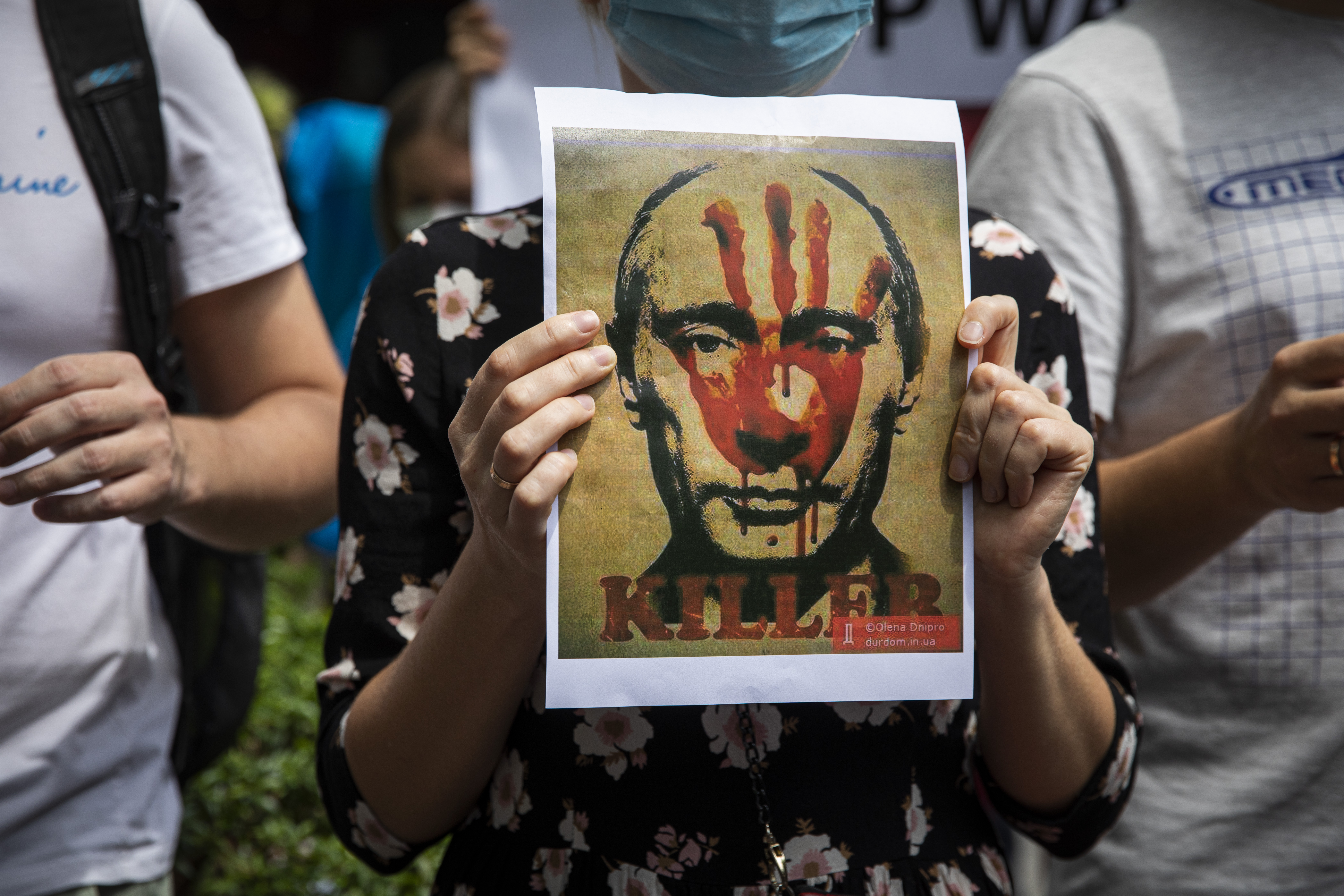 A protest outside the Russian embassy in Thailand. Russia limits access to Facebook as the social networking giant attempts to fact-check pro-Kremlin propaganda.