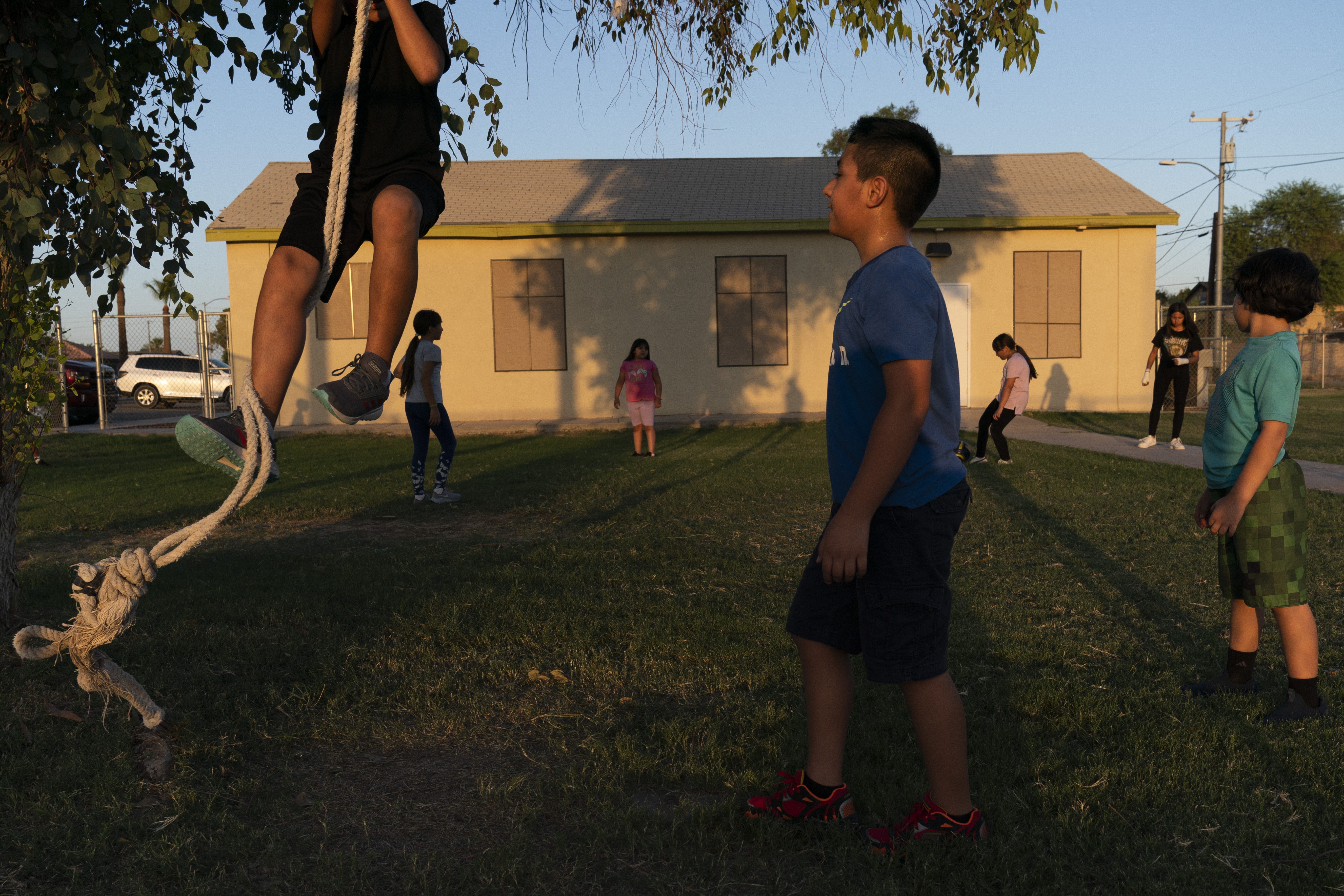 Children play in the yard of a community boxing club Aug. 19, 2021, in Somerton, Ariz. The U.S. Census Bureau on March 10 released two reports that measure how well the once-a-decade head count tallied every U.S. resident and whether certain populations were undercounted or overrepresented in the count. Any undercounts in various populations can shortchange the amount of funding and political representation they get over the next decade.