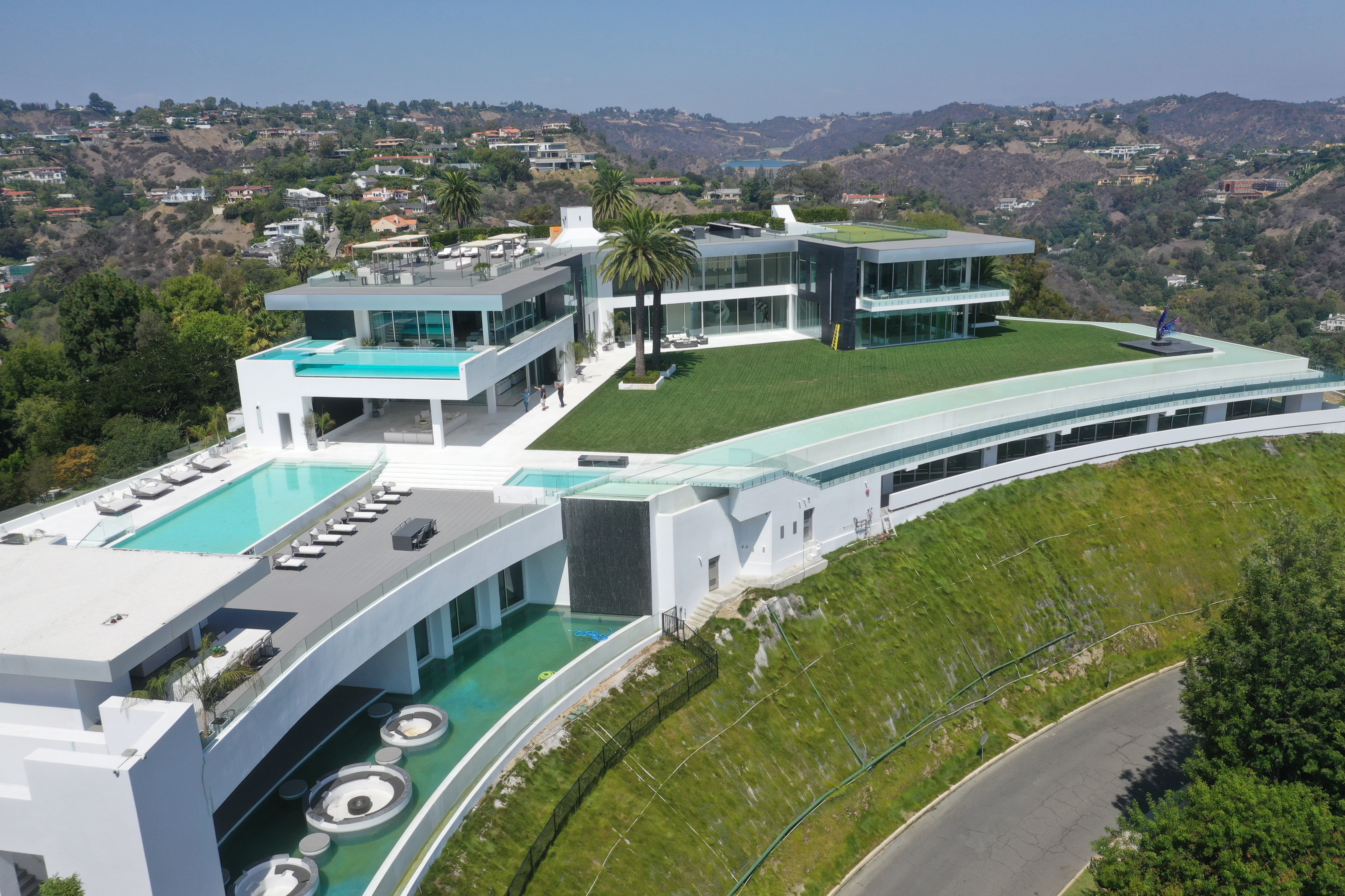 Developer Nile Niami said in 2015 that he would ask $500 million for the 21-bedroom, 49-bath hilltop Bel Air property, which also has five swimming pools and a 30-car garage.