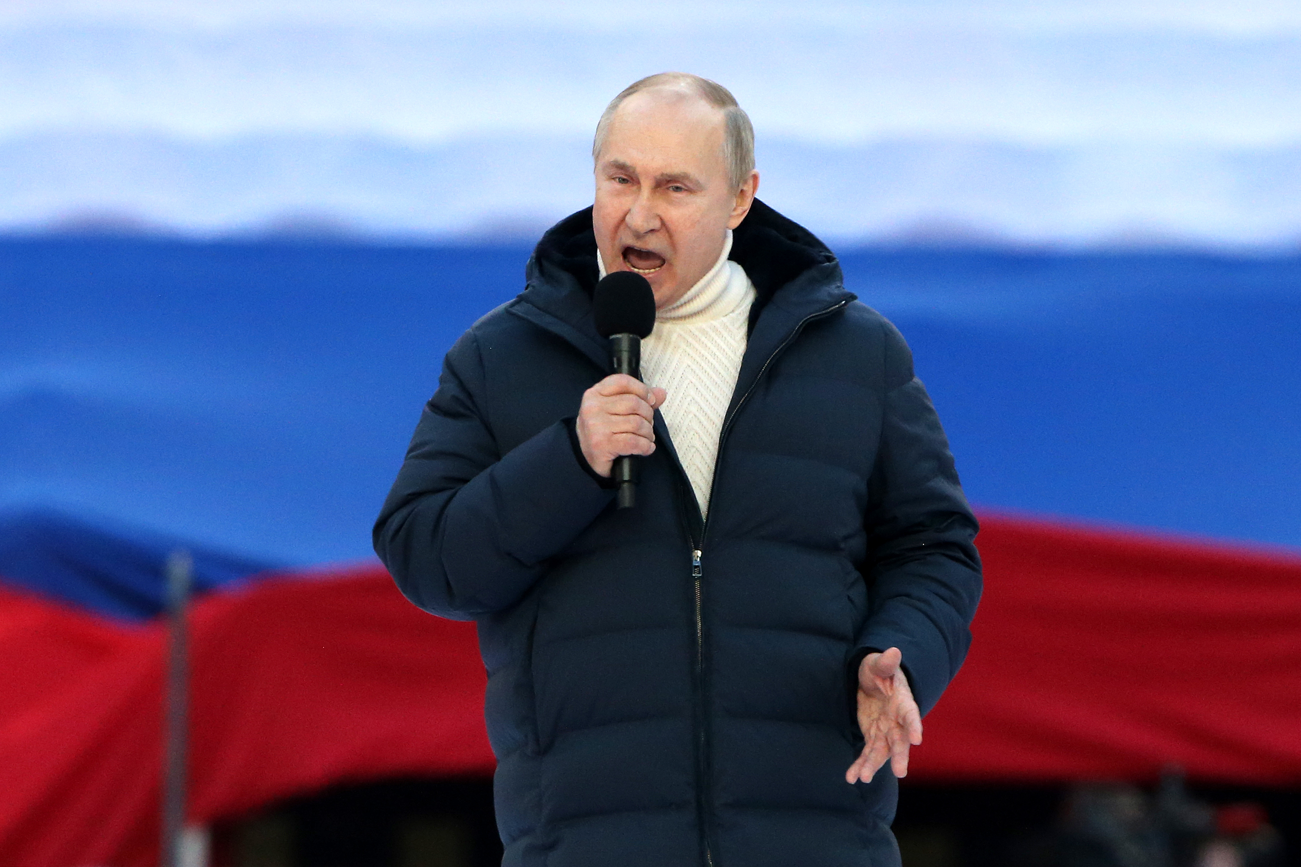 Russian President Vladimir Putin speaks during a concert marking the anniversary of the annexation of Crimea, on March 18, 2022 in Moscow. Peace talks to end the Kremlin's invasion of Ukraine faltered on Tuesday despite great excitement in the markets for a breakthrough.