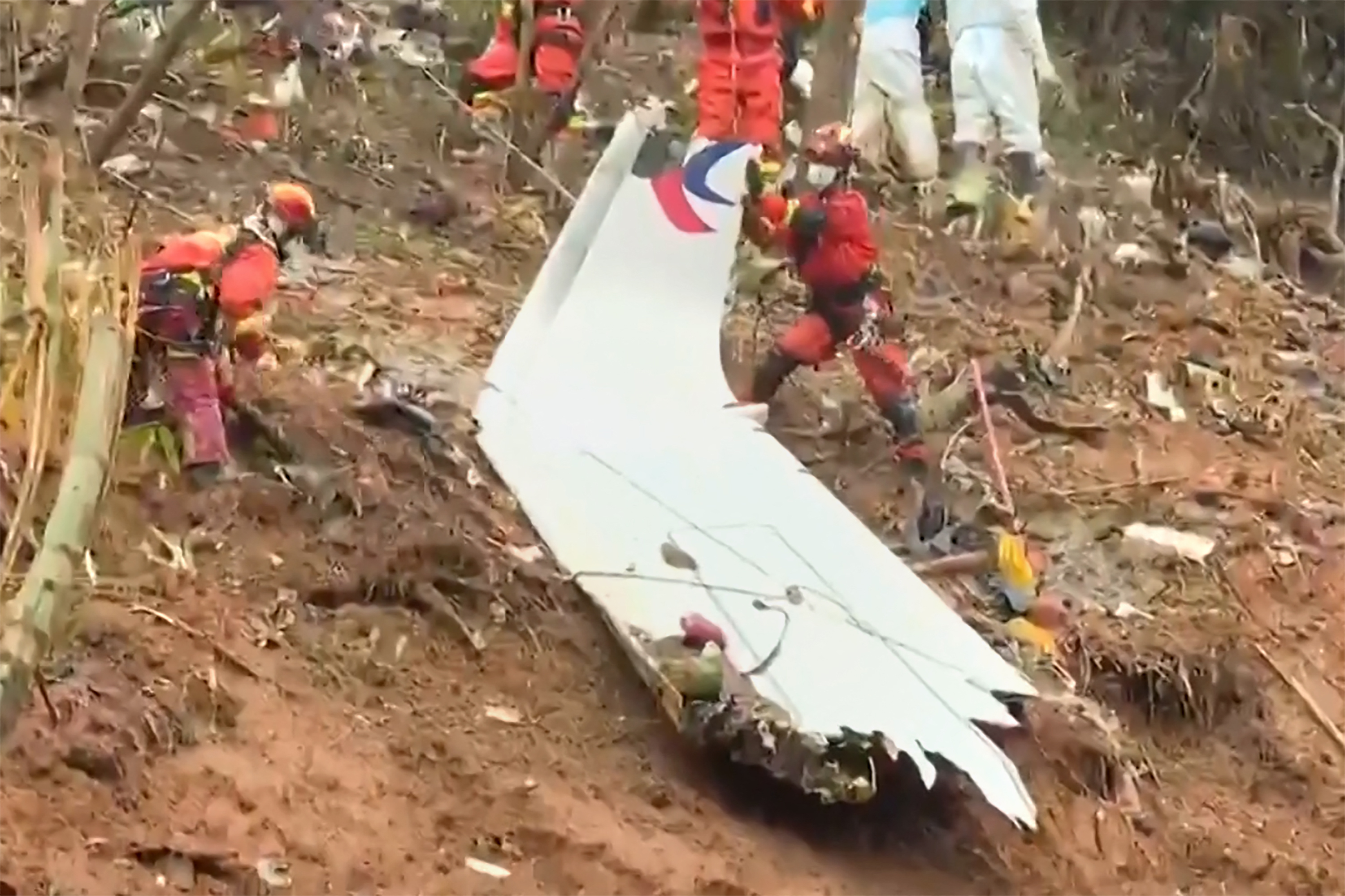 The cause of the disaster which killed 132 people has mystified aviation authorities who have scoured rugged terrain for clues, finding no survivors from what is almost certain to be China's deadliest plane crash in nearly 30 years.