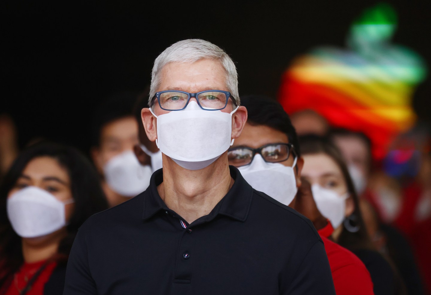 Apple CEO Tim Cook wears a surgical mask