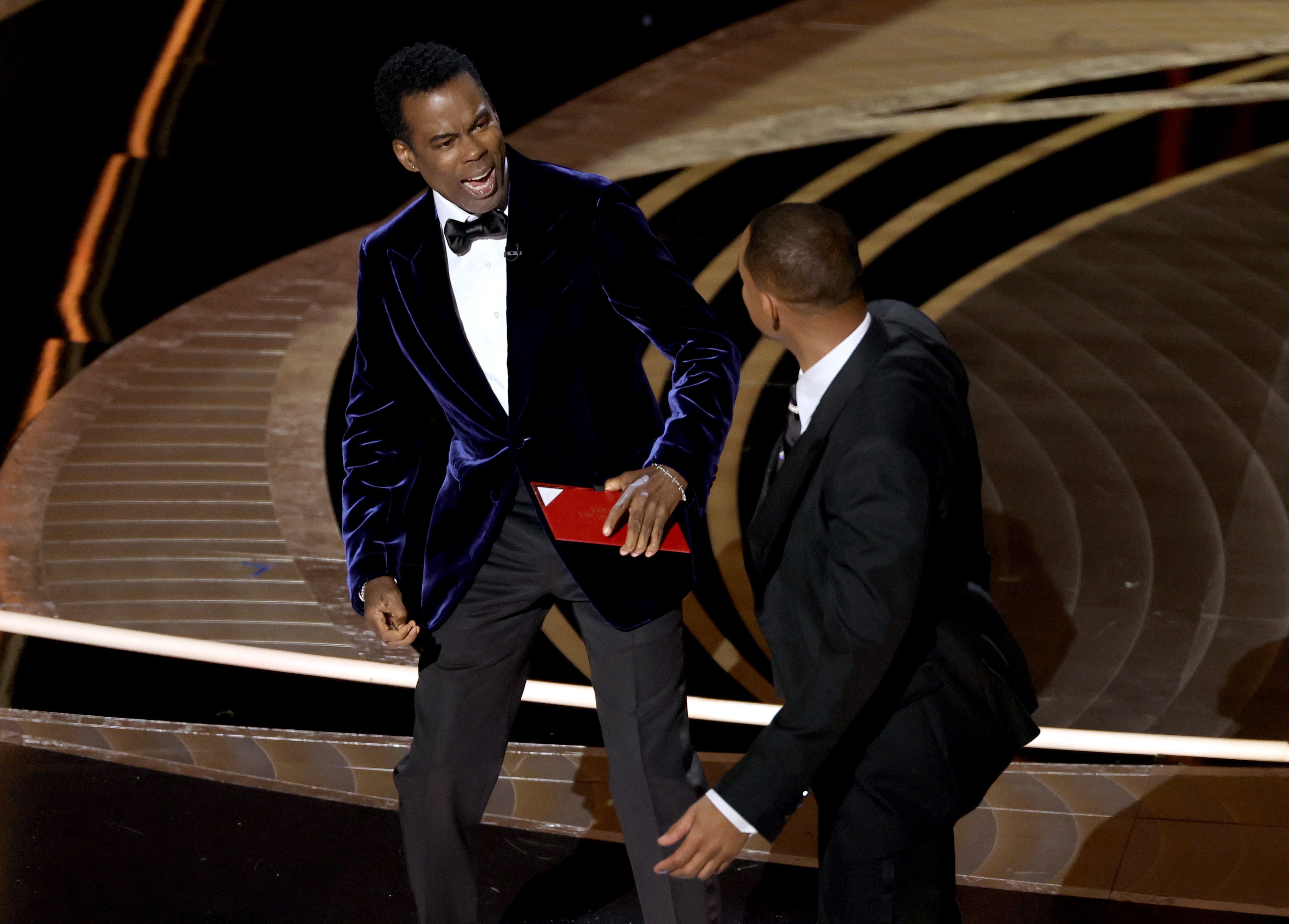 Will Smith appears to slap Chris Rock onstage during the 94th Annual Academy Awards at Dolby Theatre on March 27, 2022 in Hollywood, California.