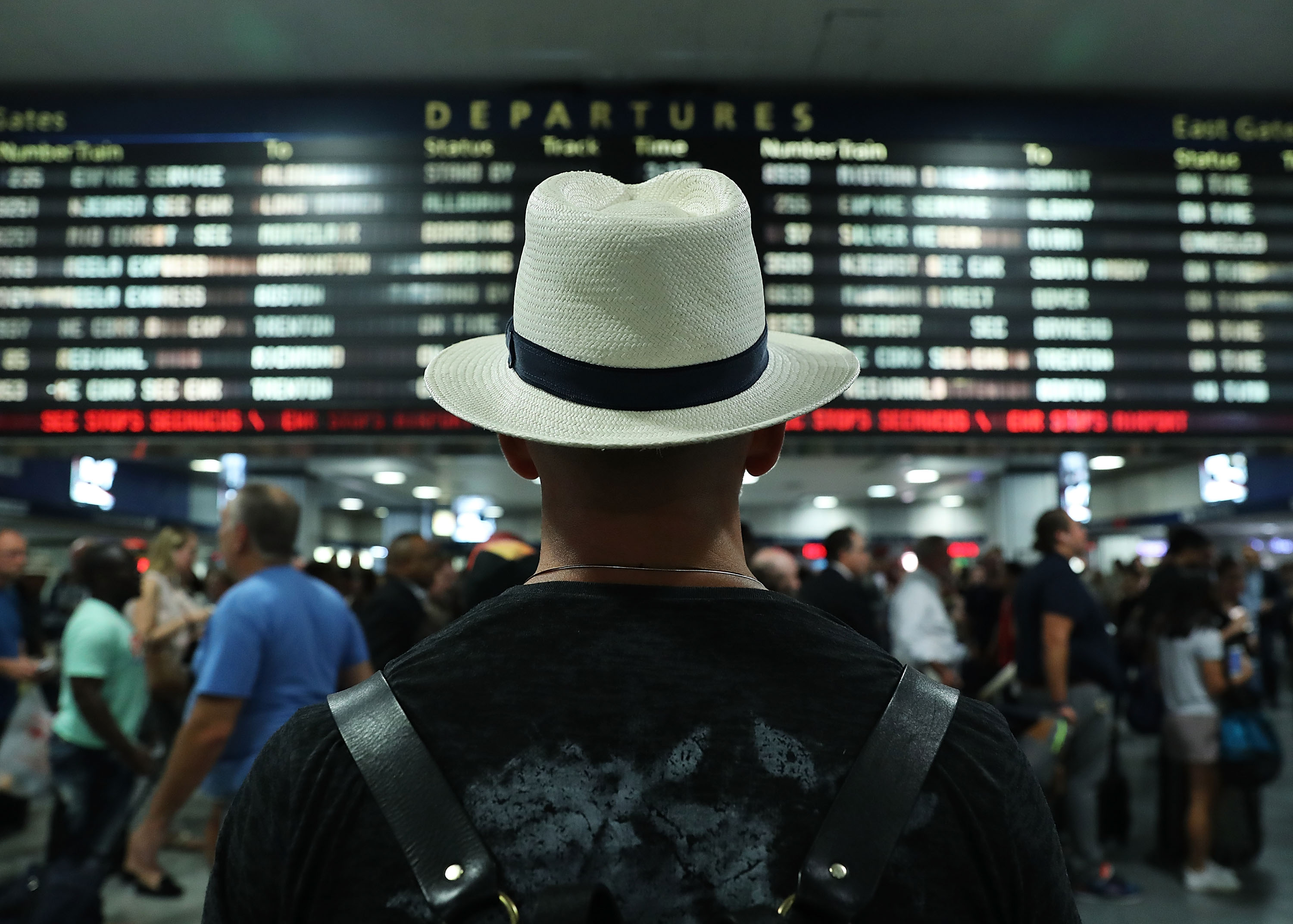 Large crowds rush to depart New York's Pennsylvania station before the start of the Labor Day holiday weekend on September 2, 2016, in New York City. 