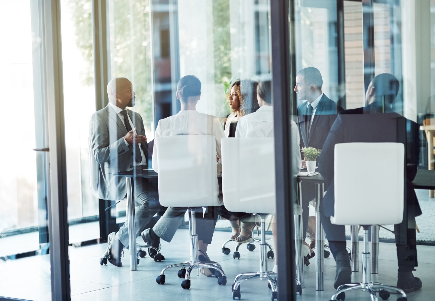Shot of a team of professionals having a meeting in the boardroom at work