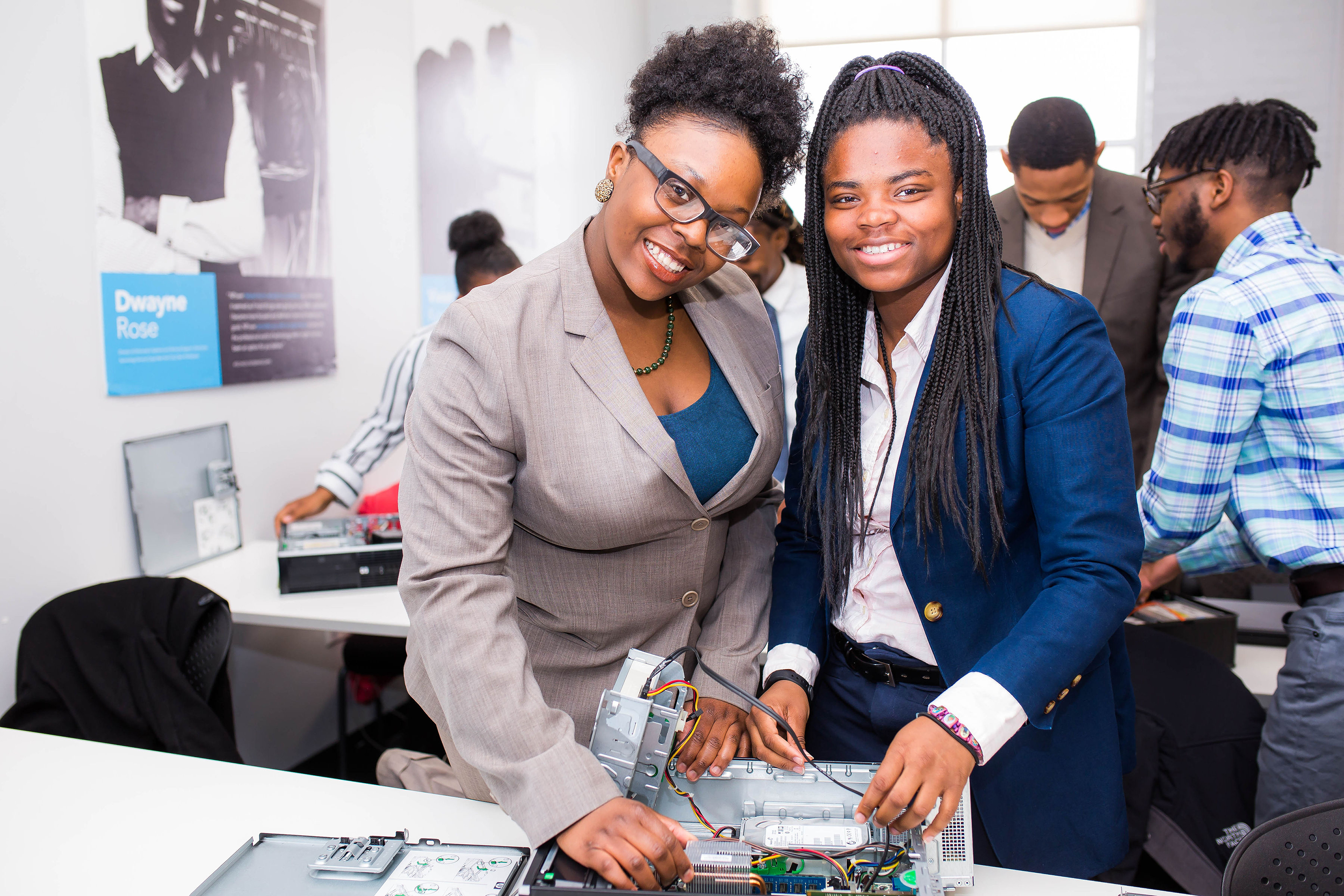 NPower New York students assembling hardware during a hands-on instruction.