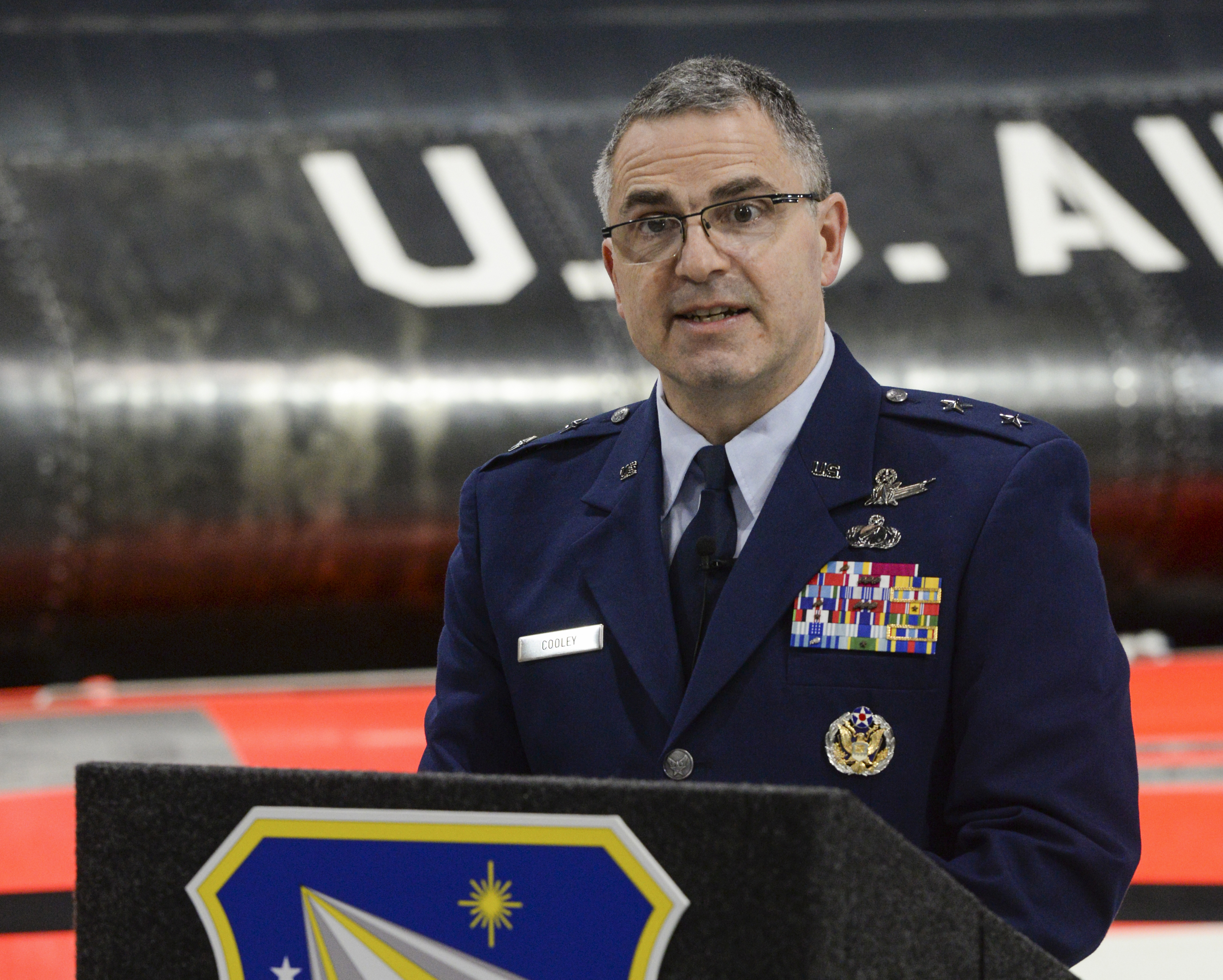 U.S. Air Force Maj. Gen. William T. Cooley, Air Force Research Laboratory commander, delivers remarks during a press conference inside the National Museum of the United States Air Force, Wright-Patterson Air Force Base, Ohio, on April 18, 2019. Cooley, has been convicted, Saturday, April 23, 2022, by a military judge of one of three specifications of abusive sexual contact in the first-ever military trial of an Air Force general.