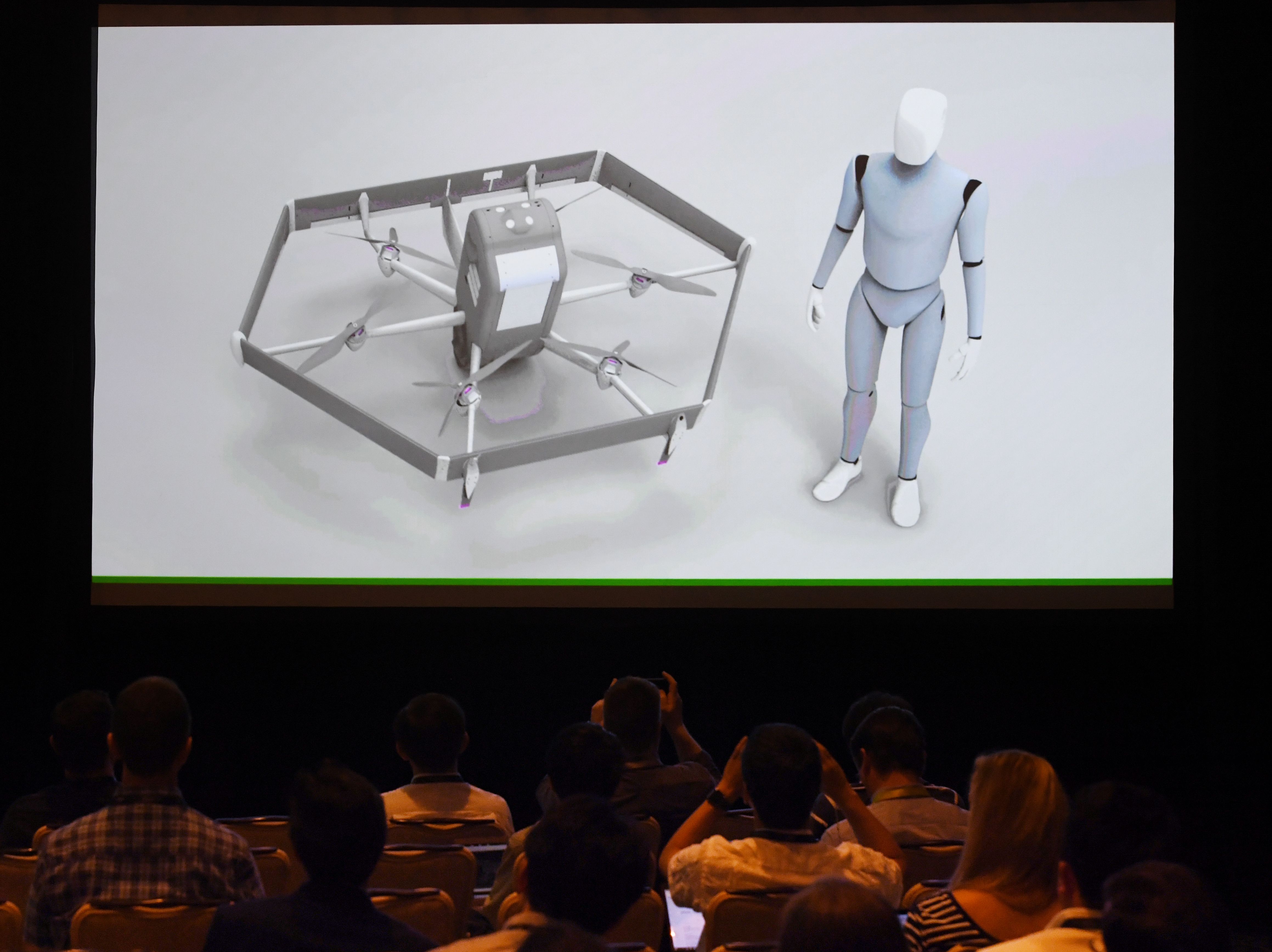 The new Amazon delivery drone is displayed on a screen during the Amazon Re:MARS conference on robotics and artificial intelligence in Las Vegas, Nevada, on June 5, 2019.