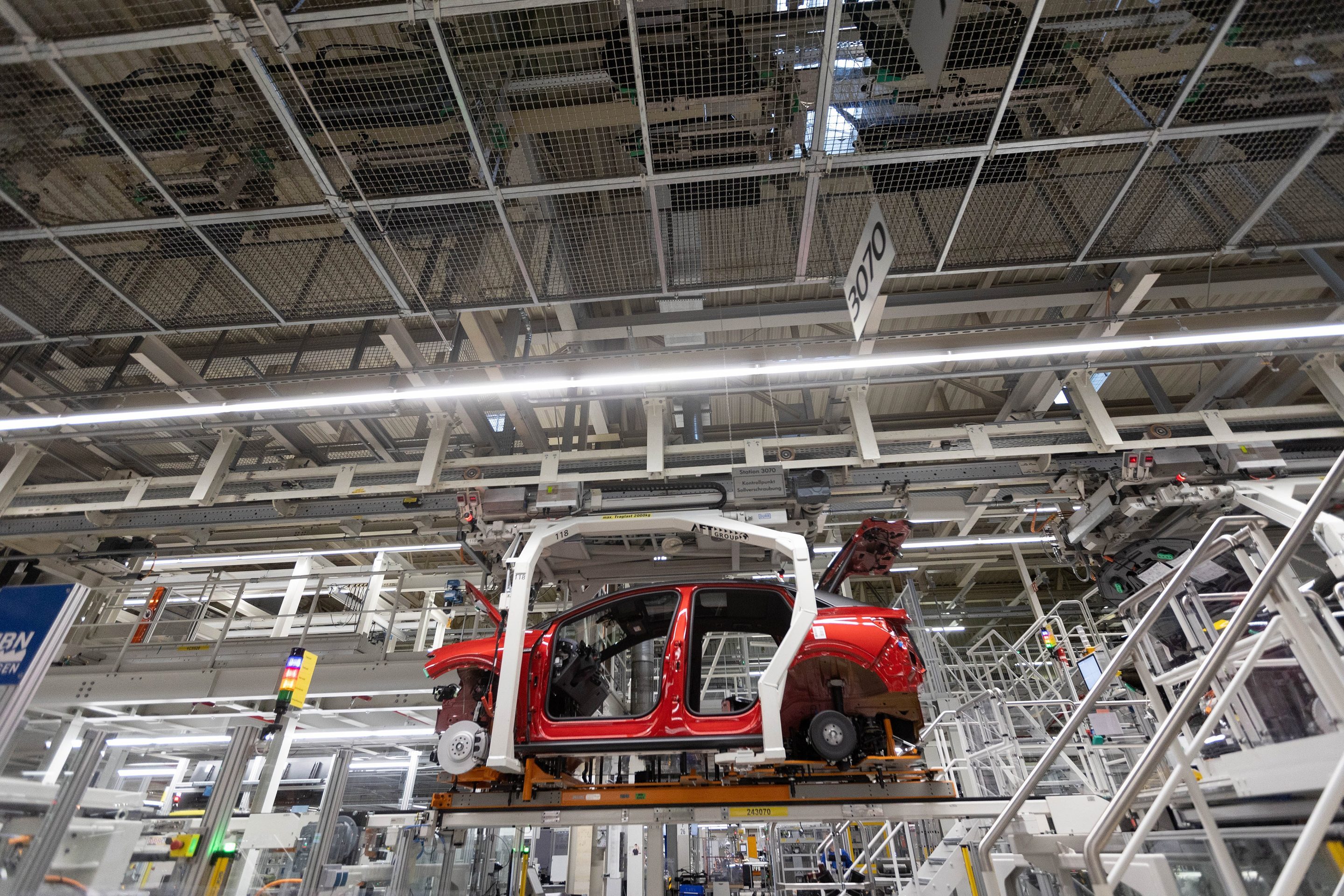 The body of a Volkswagen AG (VW) ID.5 electric sports utility vehicle (eSUV) on the assembly line during a media tour of the automaker's electric automobile factory in Zwickau, Germany, on Thursday, Jan. 27, 2020. On Dec. 9, Chief Executive Officer Herbert Diess, delivered his largest plan yet for electrification, allocating 89 billion euros ($100 billion) to EV and software development over the next half decade.